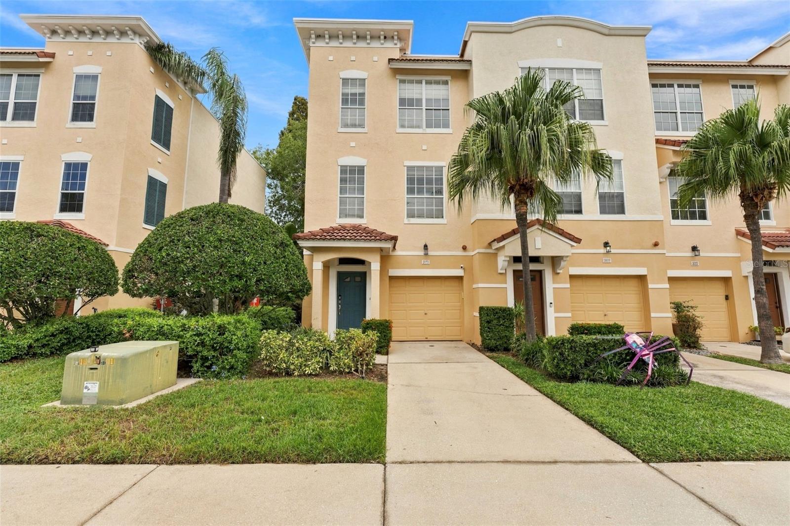Located in the highly sought-after, gated Bayshore West community, this beautiful 3-bedroom/4-bathroom townhome offers the perfect blend of style, comfort, and convenience. When you first walk-in, you’ll notice the home benefits from abundant natural light, being a corner-unit, creating a bright and welcoming atmosphere throughout. The first-floor features a spacious bedroom, with its own private covered porch, and storage closet. You also have a large extended garage, and a convenient half bath on both the 1st and 2nd floors, making entertaining a breeze. The two upstairs bedroom suites each have a private en-suite bathroom, and the master suite includes a brand-new built-in walk-in closet, dual sinks, and a relaxing garden tub.The updated kitchen features stainless steel appliances, granite countertops, well-crafted shaker-style cabinetry, a pantry closet, and a separate dry bar. Just off the kitchen, enjoy your private balcony, perfect for grilling and entertaining, with added privacy and a separate porch below. The home has been upgraded with all new luxury vinyl flooring throughout, fresh interior paint, and more. Bayshore West offers a community pool, designated dog areas, and mature landscaping. The low monthly HOA fee includes water, sewer, trash, cable, lawn care and maintenance, building insurance, roof and roof maintenance, community pool and amenities, and common-area pest control. Ideally located near Bayshore Boulevard, Downtown Tampa, Tampa Yacht Club, popular local restaurants, major highways, and MacDill AFB, this home offers comfortable, low-maintenance living in one of South Tampa's most desirable neighborhoods.