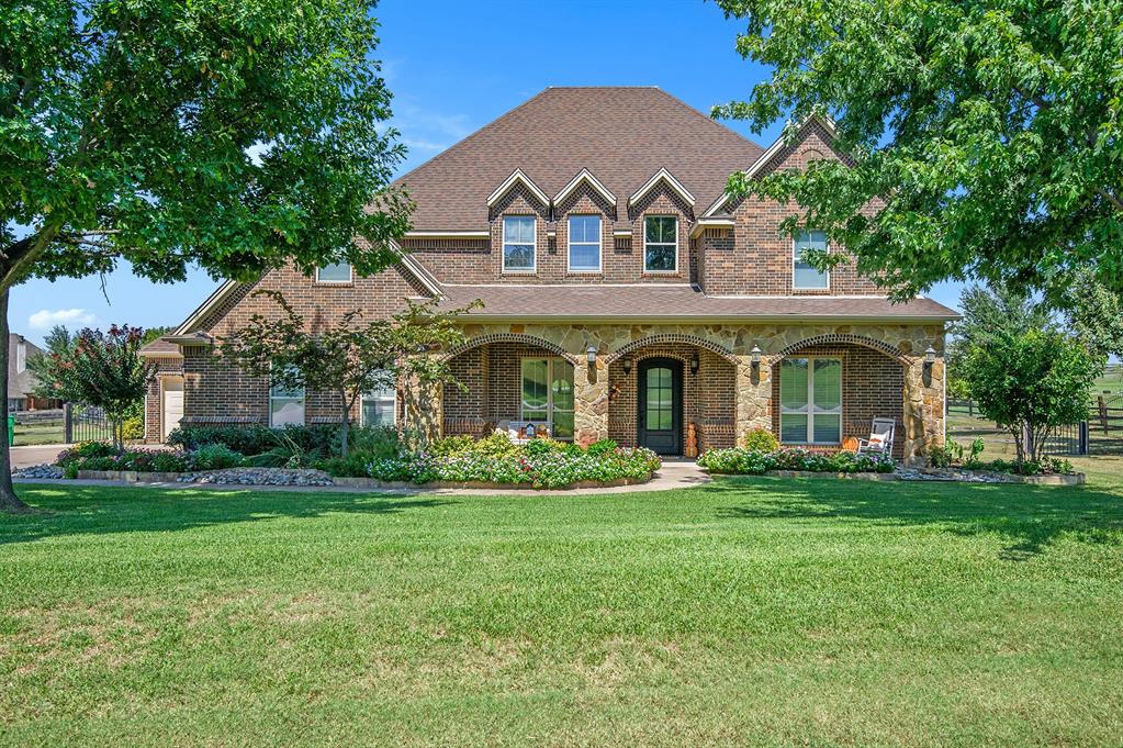 Welcome to this stunning ready for the new owners Ft Worth home located in the exclusive Vista Ranch neighborhood. Close to Shopping, Restaurants and Interstates yet tucked away for a country resort lifestyle. This Luxurious home blends comfort and functionality inside and out and is priced to sell quick. Recently valued at $900,000 it includes a DOWN TO THE STUDS RENOVATION that cost over $350,000 and was completed just under 4 years ago. The chef's kitchen with its spacious island, cabinets and pantry, the lower level was with wood look neutral colored tile, primary bathroom with a high end tiled shower, a spiral staircase from the upper balcony to the lower lever outdoor entertainment area and pool, the water well, roof, WHOLE HOUSE GENERATOR were all part of the renovation, and many more updates.  The downstairs is open with the living room adjacent to the kitchen allowing space when you have your large gatherings. The primary bedroom also downstairs is tucked away from the rest of the entertaining area also has easy access to your 3 car garage and oversized laundry room. There is also a bonus room on the first floor that offers versatility as a game room, extra sitting space or another office.  Upstairs, a built-in desk area provides an ideal office space or bonus bedroom with balcony access. Three additional bedrooms offer plenty of room for everyone with one featuring its own ensuite bath and connected additional bonus space.Step outside to enjoy a fully fenced backyard built for entertaining and relaxation. A covered patio with a seating area and outdoor kitchen overlooks a pristine pool, while stair access to the upper balcony provides an additional outdoor escape. With plenty of green space, there’s room for play, pets, or gardening.  Combining generous space, thoughtful design, and resort-style outdoor living, this property is truly a one-of-a-kind find in Ft Worth. Mortgage incentives and rate buy down may be available for qualified Buyers.