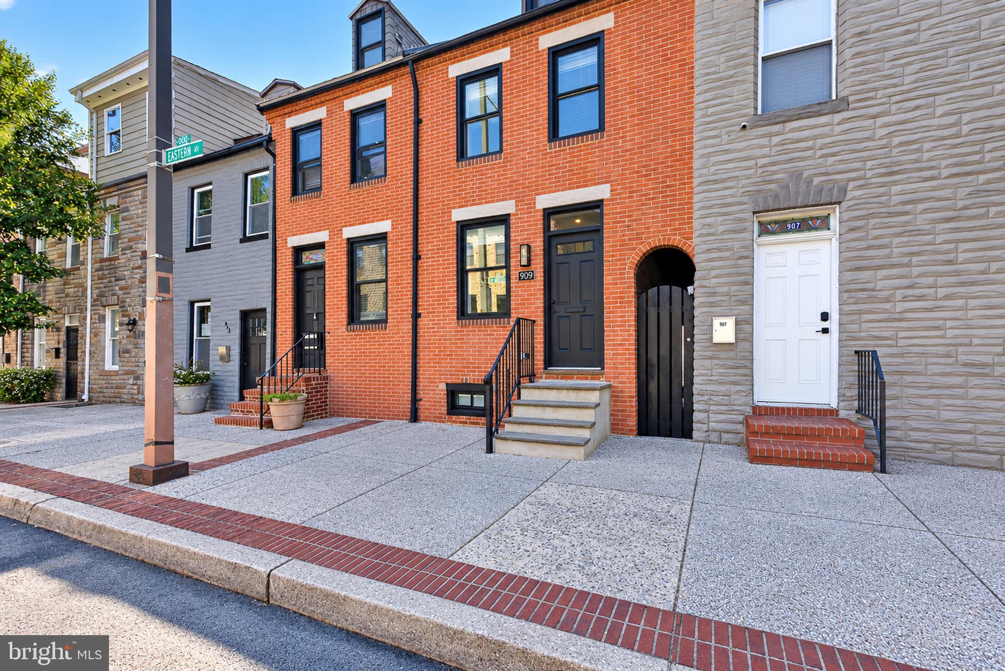 Welcome to this beautifully renovated 3-bedroom, 2.5-bath interior row home in the heart of Little Italy. Thoughtfully updated throughout, this home combines modern finishes with a functional layout and plenty of flexible living space.The open first floor features a spacious living and dining area that flows seamlessly into a gorgeous kitchen equipped with stainless steel appliances. A convenient first-floor washer and dryer add to the home's everyday functionality.Upstairs, the primary bedroom offers a private en-suite bathroom with a walk-in shower. The third floor provides a private additional room that can serve as a third bedroom, home office, study, or quiet retreat—perfect for those who want a little separation from the rest of the home.The partially finished basement provides additional living, recreation, or storage space, while a rear crawlspace offers convenient extra storage.One of the home's standout features is its private parking pad with space for two cars. The pad is accessed from the alley through a locked gate using a fob, offering secure and convenient off-street parking—a valuable amenity in Little Italy.Located in the vibrant Little Italy neighborhood, this fully renovated home offers a combination of modern updates, flexible living spaces, and private parking in a highly desirable city location.
