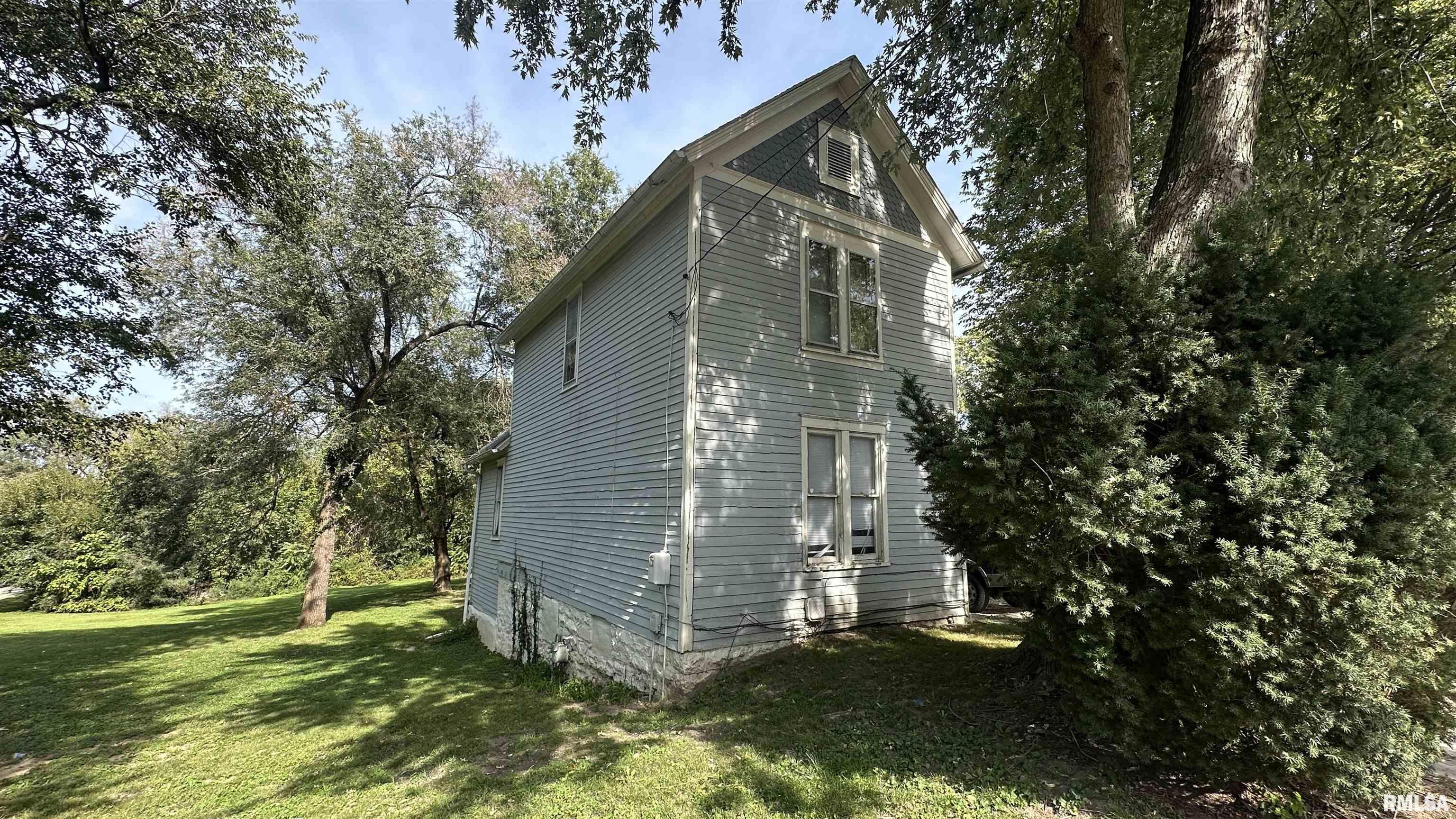 AFFORDABLE OPPORTUNITY AT JUST $62,900! Whether you're looking for your next investment property or an affordable place to call home, this 2-bedroom, 1-bath, 2-story home offers plenty of potential! Situated on two parcels totaling approximately one-half acre, this property offers more space than you might expect at this price! Inside, you'll find charming original wide-plank hardwood floors, ample storage. Currently used as a rental, the home could benefit from some updates and improvements but offers a great starting point for the price. Affordable price, extra land and plenty of potential.