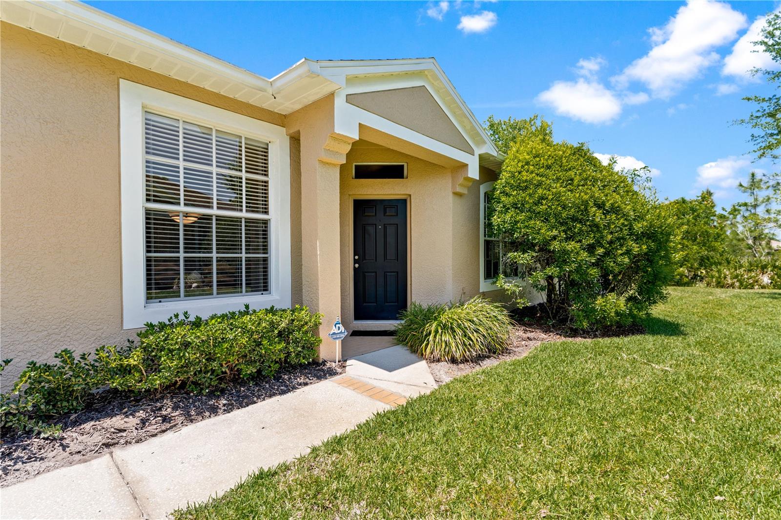 Pond view, screened lanai, gated community with pool, and approximately 0.3 mi to Clark Elementary. This 3-bedroom Tampa home is positioned on a cul-de-sac and features a 2-car garage with new garage door opener. HOA includes roof and exterior maintenance, providing reduced exterior upkeep. Roof replaced in 2016 and new A/C offer key system updates. Interior includes a dedicated laundry room, functional living and dining layout, and pond views from main living areas. Screened lanai overlooks the water, providing covered outdoor space for year-round use. Property has been well maintained with limited occupancy over time. Community amenities include a pool and maintained common areas. Located approximately 2–3 mi to I-75 access, 1.5–2 mi to Publix Super Market, 3–4 mi to Tampa Premium Outlets, and within convenient distance to Moffitt Cancer Center, USF, and USAA offices. Also located near Flatwoods Park trail system for biking, running, and outdoor recreation. Schedule a showing to view this property.