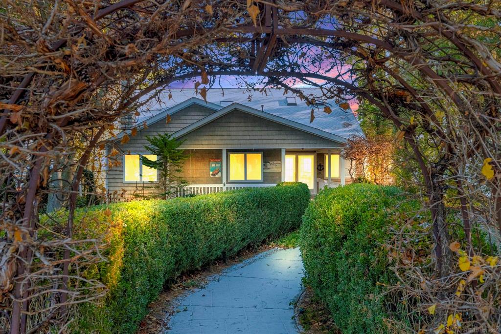 Discover the charm of this 4-bedroom, 3-bath lakefront home offering breathtaking, wide-open views from the moment you arrive. A beautifully crafted brick-paver driveway leads you toward a stunning looking home overlooking Lake Huron adding a distinctive, upscale touch that sets the tone for this one-of-a-kind property.  Step inside and experience a warm, inviting layout designed for comfort and relaxation. The kitchen overlooks the lake, giving you the perfect backdrop while washing dishes or preparing meals. Enjoy cozy evenings by the fireplace, or gather in the dining room with lake views, where every meal feels like a getaway. Two bedrooms upstairs, one full bath and a great space for family gatherings.  A spacious deck stretches across the lakeside, ideal for morning coffee, sunset dinners, or simply soaking in the peaceful scenery. Just off the garage, you'll find a charming guesthouse, perfect for visitors or an extra retreat. Heading toward the shore is a quaint lakefront cabana to change your clothes allows you to transition from beach time to relaxation with ease. This is more than a home-it's a lifestyle. An everyday getaway. A place where lakefront dreams come to life.