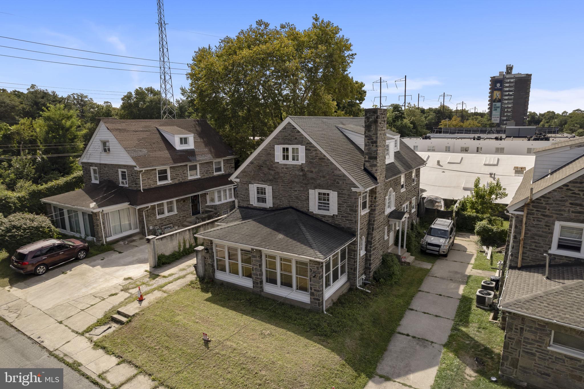Step inside this expansive Philadelphia residence offering over 3,300 sqft of space. Featuring 6 bedrooms and 4.5 bathrooms, the layout is perfect for both everyday living and hosting guests. The main floor welcomes you with rich hardwood flooring, a warm fireplace, and an open flow that blends elegance with comfort. Upstairs you’ll find 5 spacious bedrooms, while the fully finished basement offers a complete in-law suite with its own kitchen, bedroom, bathroom, and private entrance. A detached 2-car garage plus driveway parking for 4 makes this home as practical as it is stunning.Located just steps from the train and minutes from City Avenue, I-76, and Route 1, this home combines suburban comfort with city convenience. Within a 10-minute radius you’ll enjoy Fairmount Park’s trails, gyms, shopping, and an exciting mix of restaurants and cafes. With space, style, and unbeatable access to everything Philadelphia has to offer, this property delivers the ultimate in modern living.