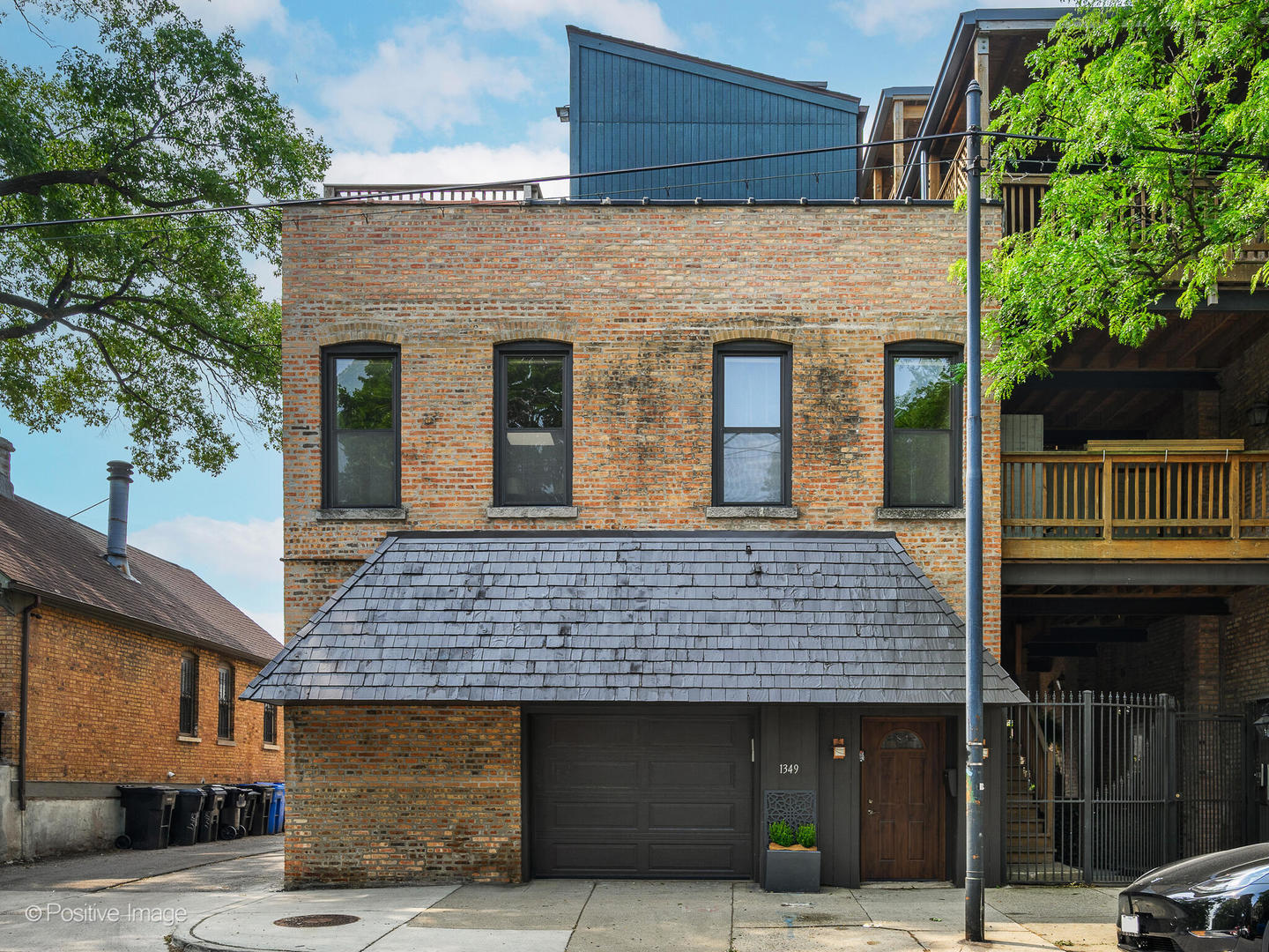 Discover the epitome of Lincoln Park living in this three-bedroom, three-bath, three-level standalone townhome, ideally situated in the coveted Oscar Mayer School District. Thoughtfully updated throughout, this residence offers a spacious and versatile layout-complete with two family rooms-perfect for entertaining and everyday comfort. Flooded with abundant southern light, the main level features one of two generous ensuites, complete with dual closets, a separate shower, and a soaking tub. A second bedroom sits adjacent to a full hall bath with shower. Upstairs, you'll find another ensuite with a walk-in closet and an adjacent full bath. The open-concept kitchen-updated and designed for connection-flows seamlessly into the dining and family rooms. Surrounded by a wall of windows and two skylights, this space is bathed in natural light all day long. On the third level, enjoy sweeping city views from the private wraparound rooftop deck or the upstairs family room, where three floor-to-ceiling glass doors blur the line between indoors and out. Curl up by the fireplace, select a favorite book from the built-in bookcase, or pour a drink from the beverage refrigerator. This level also offers incredible flexibility-ideal for a home office, media lounge, or fitness space-with sunlight streaming through east- and south-facing windows. Additional perks include an attached garage plus a dedicated exterior parking space, two storage lockers, and a bike room. Recent owner updates include a new washer/dryer, fresh paint throughout, and elegant French glass doors for the third bedroom. Located just minutes from Lincoln Park's premier shops, acclaimed restaurants, and iconic attractions, this home blends urban luxury with unbeatable convenience. Showings begin Tuesday, August 12th.