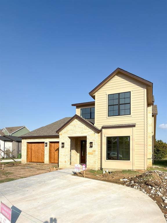 Discover this charming Craftsman style 4 bed, 4 bath home by Lily Grace Homes, perfectly placed on a large 0.69 acre lot ideal for all of your outdoor entertainment and relaxation designs.   Inside, 10 ft ceilings (11 ft in the family room), 7.5 in European white oak floors, and 8 ft shaker doors create an inviting, open feel. The kitchen boasts Bosch appliances, a quartzite island, walk-in pantry with sink, and a stylish prep kitchen designed for everyday ease and entertaining. The thoughtful floor plan includes a private office and first floor guest suite. Sliding glass doors open to an extended covered patio overlooking the spacious yard. Energy efficient touches including foam insulation, tankless water heater, 17 SEER HVAC with Ecobee thermostat, and Low E windows adding sustainability and value to the home.  Roanoke delivers that small town feel with the added perk of a lively Oak Street full of dining, shops, and local energy.