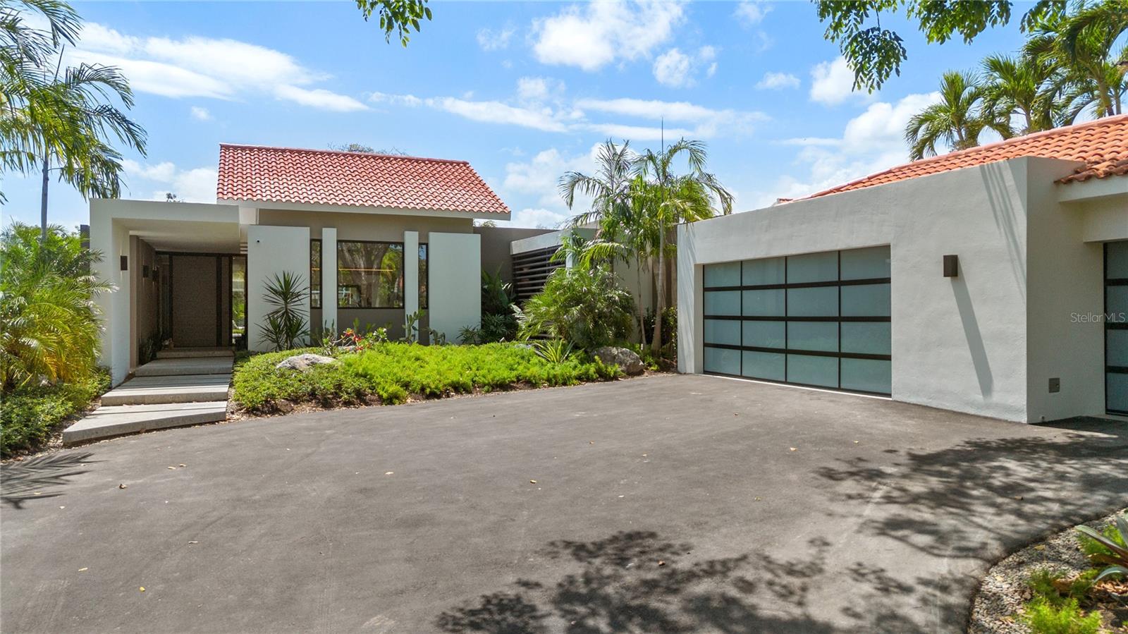 Welcome to your dream home in the coveted Dorado Beach East, an exclusive gated community that redefines luxury living in Puerto Rico. This stunning five-bedroom, five-and-a-half-bath residence has undergone an impeccable renovation, offering you a unique opportunity to own a home that feels brand new. From the moment you step inside, you’ll be captivated by the exquisite craftsmanship and modern design that permeate every inch of this remarkable property.As you enter, you’re greeted by an expansive foyer leading to an open-concept living area, accentuated by soaring vaulted ceilings and magnificent floor-to-ceiling windows that bathe the space in natural light. The elegant living room flows seamlessly into a state-of-the-art gourmet kitchen, complete with high-end built-in appliances, custom cabinetry, and a generously sized island that serves as both a centerpiece for culinary creations and a perfect gathering spot for family and friends. This kitchen is a chef’s dream, designed for both functionality and flair.The luxurious primary suite is a true sanctuary, featuring remarkable views of the lush backyard and the serene lake. It boasts a spa-like en-suite bathroom that will take your breath away, complete with a standalone soaking tub, dual vanities, and expansive his-and-her closets that provide ample storage. Each of the additional bedrooms is thoughtfully designed, offering generous space and privacy, making them perfect for family members or guests.Step outside to discover an expansive covered terrace that is ideal for morning coffee or evening entertaining under the stars. The outdoor space flows into a beautifully landscaped pool area, featuring ample yard space for future enhancements or landscaping, allowing you to create your own personal oasis. A separate guest house adds to the allure of this property, complete with its own kitchen and full bath, providing versatility for hosting visitors or serving as an office or gym.Dorado Beach is not just a place to live; it is a lifestyle steeped in luxury and leisure. As a resident of this exclusive community, you’ll have access to two championship golf courses, each designed to challenge and delight players of all skill levels. Indulge your palate at seven exquisite dining establishments, five of which has breathtaking ocean views, providing the perfect backdrop for memorable meals with loved ones.For those who enjoy an active lifestyle, Dorado Beach features pickleball courts, tennis courts, and a state-of-the-art fitness center. Watermill Park is a family favorite, offering a fun-filled day for the whole family. With several pristine pools situated throughout the community and scenic biking trails perfect for leisurely rides or invigorating workouts, you’ll find endless opportunities for recreation and relaxation.Residents of Dorado Beach enjoy the unique convenience of golf cart access throughout the community, fostering a friendly atmosphere where neighbors become friends and every day feels like a vacation. The tranquil surroundings, combined with the vibrant community spirit, create a truly unparalleled living experience.This exquisite property in Dorado Beach East is a rare find, combining luxurious living with a lifestyle that many only dream of. Don’t miss your chance to experience the best that Dorado Beach has—schedule your private showing today and step into a life of elegance, comfort, and unparalleled beauty!
