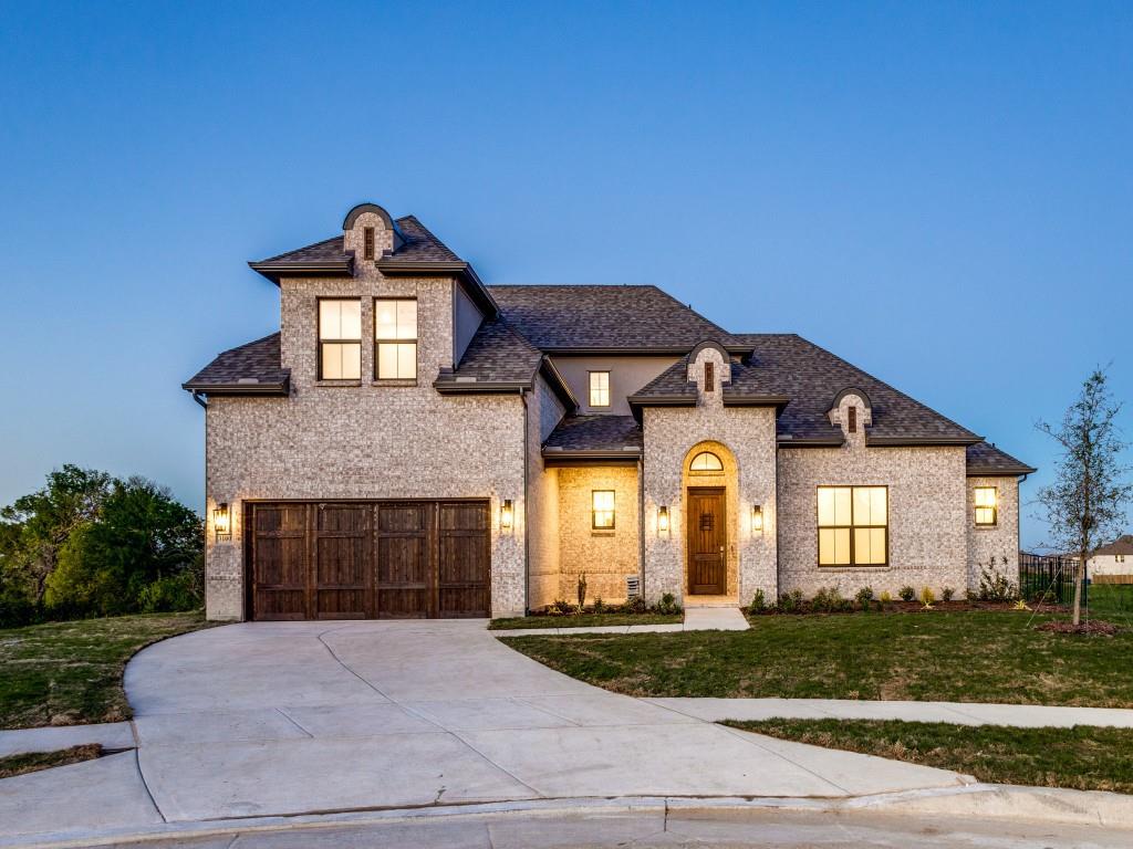 Gorgeous Wyatt James Builder NEW CONSTRUCTION with estimated completion end of of October 2025! Beautiful drive up on 80 foot Estate lot on quiet street with green space behind! Primary bedroom and second ensuite bedroom downstairs plus 3 bedrooms and huge gameroom upstairs! Open plan with spacious living and large dining room with large picture windows across the rear! Fantastic kitchen featuring Calacatta quartz, custom built site finished white oak cabinets, large social island, Electrolux Stainless Steel appliances with gas range, custom vent hood and large walk in pantry! Nail down white oak hardwoods throughout the downstairs living areas! Stunning designer finishes including quartz countertops in all baths and laundry. Primary suite has dual sinks, free standing soaker tub large drop slab full tile walk in shower, linen storage plus huge walk in closet! Large outdoor living space!! Superior construction features included but not limited to Zip System Sheathing, Engineered Web Truss System. Advantech SubFloor Insulation, Full Foam Encapsulation insulation, Lennox HVAC System, Tankless Hot water delivery, Cedar garage doors, plus PELLA Windows. Builder provides One, Two and Ten Year fully transferrable Warranties.  PHOTOS ARE REPRESENTATIVE OF FLOORPLAN. ELEVATION AND FINISHES WILL VARY.