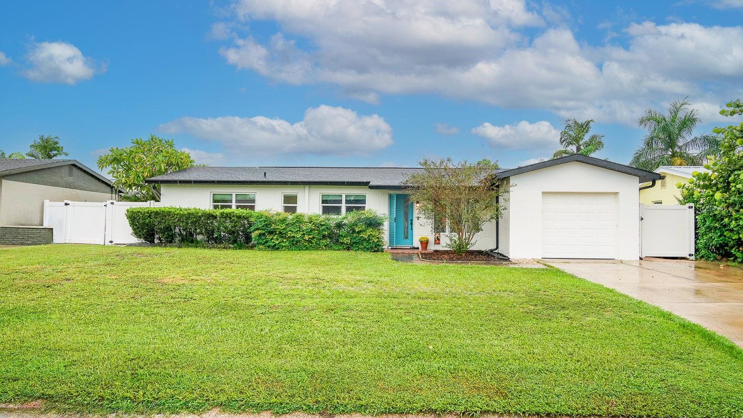 Welcome to this spacious, bright and airy St. Petersburg pool home offering 2,042 square feet of interior living space, concrete block construction, a one-car garage, and a fantastic location! Lovingly maintained by just two owners, this clean and inviting home offers a comfortable, open feel with plenty of natural light throughout. Enjoy the Florida lifestyle in your own backyard oasis, complete with a saltwater swimming pool and built-in spa, perfect for entertaining family and friends or simply relaxing after a long day. The home also boasts several significant improvements, including a newer roof (2024), hurricane-impact windows and rear door installed in 2024, a hurricane-rated garage door, updated electrical wiring (2015), and fresh exterior paint (2026). These major improvements offer buyers added peace of mind and help take some of the larger expenses off the table. Located in desirable Flood Zone X! The location is hard to beat, with Tyrone Square Mall, shopping, restaurants, and everyday conveniences just minutes away. You're also conveniently located near vibrant downtown St. Petersburg, with its waterfront parks, dining, shopping, and entertainment. The world-famous Gulf beaches and Tampa International Airport are also within easy reach. Whether you're relaxing poolside, entertaining guests, exploring downtown St. Pete, or spending the day at the beach, this well-maintained home offers a wonderful combination of space, comfort, location, and Florida living!