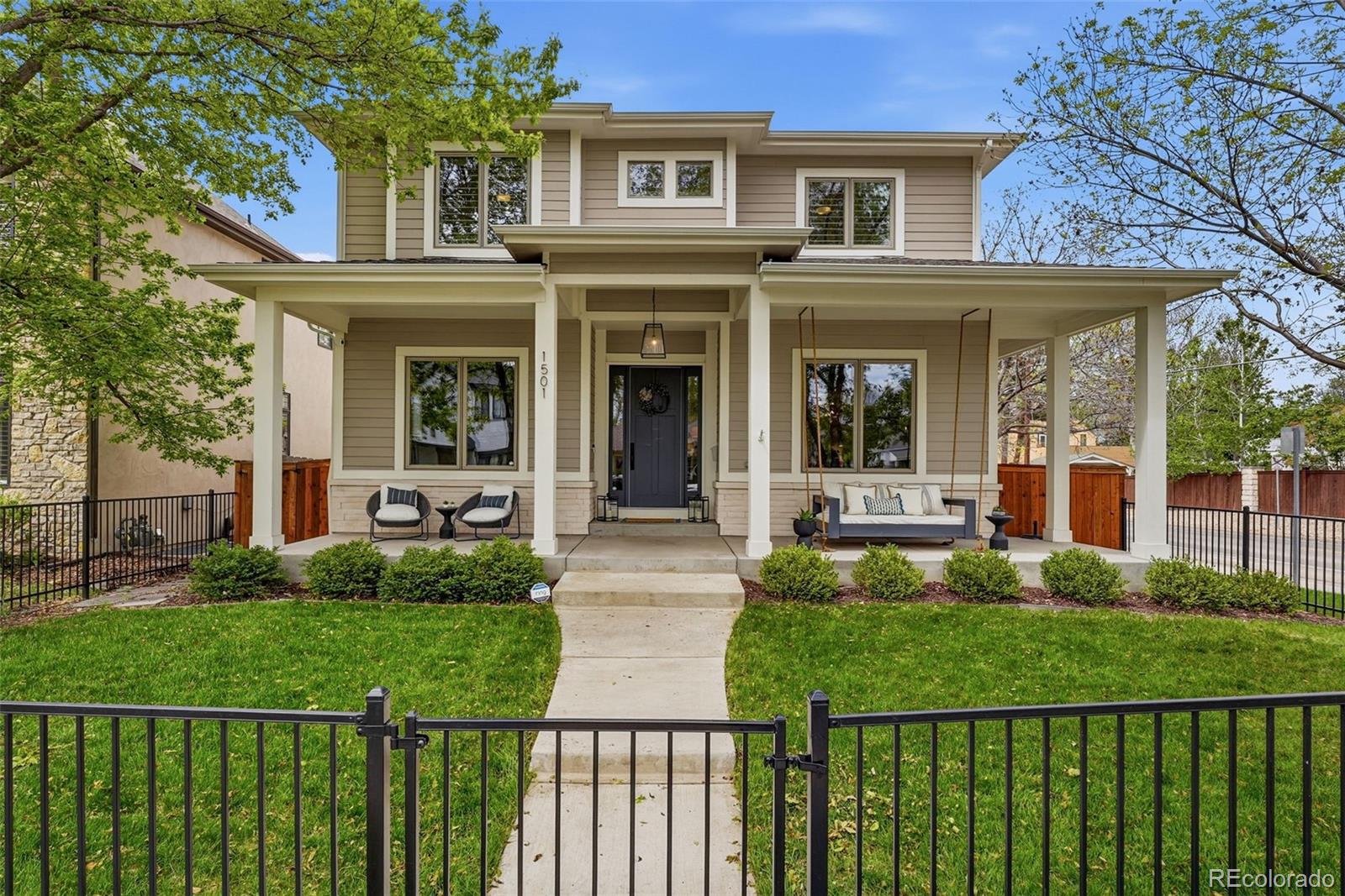 Beautifully maintained 6-bedroom, 5-bathroom home in sought-after Cory-Merrill, just minutes from Bonnie Brae and Washington Park. Built in 2018, this thoughtfully designed home offers a highly functional layout with seamless indoor-outdoor living. A welcoming front porch leads into a bright open floor plan featuring a main-floor office, spacious living area, and an expansive kitchen with a large island, breakfast nook, and clear views of the backyard. Upstairs, the spacious primary suite offers a private balcony and a well-appointed en suite bathroom, creating a relaxing retreat. The private patio with a built-in grill creates an ideal space for entertaining. The fully finished basement adds exceptional versatility with a bar area, guest bedroom, full bathroom, and a sixth bedroom currently configured as a fitness room—perfect for guests, recreation, or additional workspace. Exceptional location with convenient access to parks, dining, shopping, and everything Denver living has to offer.