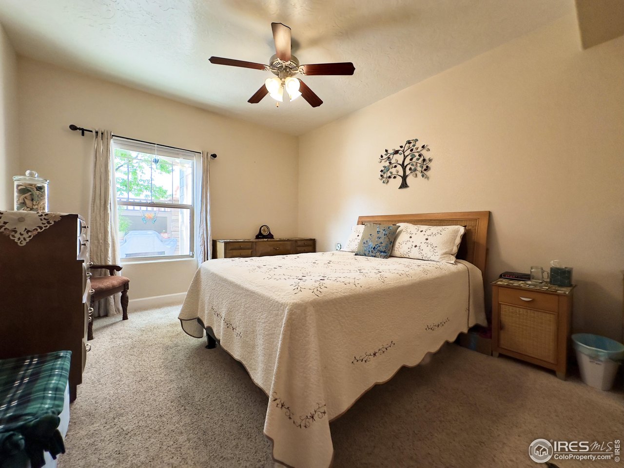 Welcome to this beautifully updated ground-floor condo in Wellington Village, offering a perfect blend of comfort, style, and low-maintenance living. This inviting 2-bedroom, 2-bathroom home features rich hardwood floors in both the main living area and second bedroom, creating a warm and cohesive feel throughout the space. The open-concept layout is anchored by a cozy gas fireplace and flows seamlessly into a bright, modern kitchen outfitted with updated appliances-ideal for both everyday living and entertaining. The spacious primary suite includes a full bath and generous closet space, while the second bedroom offers flexibility as a guest room, office, or den. With central A/C, in-unit laundry, and an attached oversized one-car garage, convenience is built in. Enjoy access to community amenities including a heated outdoor pool, clubhouse, fitness center, and putting green. The HOA covers water, trash, exterior maintenance, landscaping, and snow removal, making this home a truly turnkey opportunity in a quiet, well-kept neighborhood with easy access to Fort Collins, I-25, and local parks.