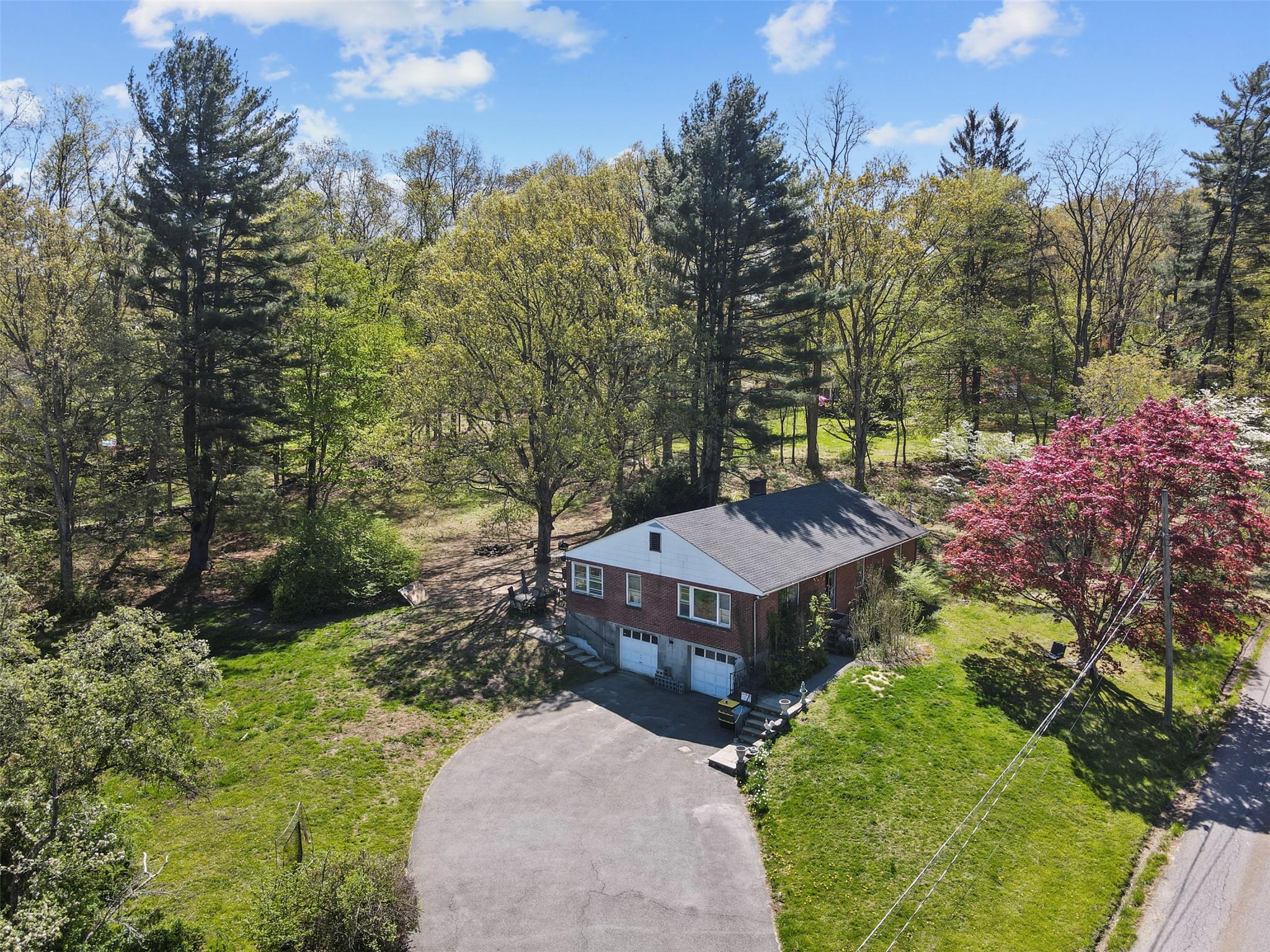 Welcome to 11 South Lane, a rare opportunity in the highly desirable Katonah PO area within the Somers School District. This 3-bedroom, 1.5-bath home is set on a beautiful and private 1.94-acre lot, offering the space, setting, and location that so many buyers are seeking. While the home is in need of updating and renovation, it presents a fantastic opportunity for those looking to customize their living space or invest in a property with strong long-term value. The layout includes a spacious main living area, a full basement with great potential for finishing or storage, and room to expand if desired. Surrounded by mature trees and natural landscaping, the property provides a peaceful, country-like setting just minutes from the vibrant village of Katonah, Metro-North train station, schools, shopping, dining, and major highways. Whether you're a first-time homebuyer ready to build equity, an investor seeking your next project, or someone looking to downsize to a manageable home with room to grow, this property offers endless possibilities. Bring your vision —this is your chance to make a home truly your own in a prime Northern Westchester location.
*The lot may be eligible for subdivision; buyers and their agents are encouraged to conduct their own due diligence to verify potential options.