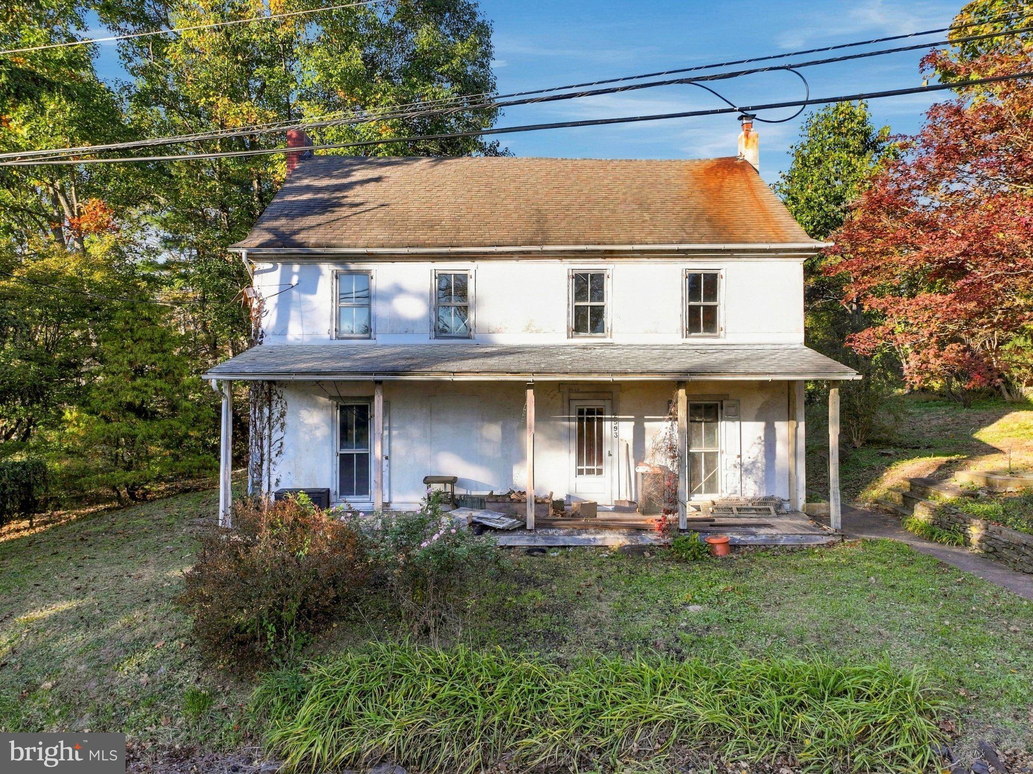 6.02 ACRES OF OPPORTUNITY – INVESTORS, DEVELOPERS & VISIONARIES WANTED!LOCATION, LAND & ENDLESS POSSIBILITIES! An exceptional opportunity awaits investors, builders, developers, and ambitious property flippers at 2593 Geryville Pike in Upper Hanover Township, Montgomery County! Situated on approximately 6.02 acres with an impressive 420 feet of road frontage, this property offers a rare opportunity to acquire a substantial parcel in the Upper Perkiomen School District.THE REAL VALUE IS IN THE LAND! Featuring approximately 262,231 square feet of gently sloping terrain, abundant wildlife, mature trees, and natural surroundings, this expansive property offers a picturesque setting with tremendous potential. Whether envisioning a custom-built estate, a complete property transformation, or exploring possible subdivision and redevelopment opportunities, this parcel provides an exciting canvas for your imagination. All potential uses and development plans are subject to township zoning, approvals, and applicable regulations.COUNTRY CHARM MEETS STRATEGIC CONVENIENCE! Enjoy the peaceful surroundings of this scenic property without sacrificing accessibility! Centrally positioned between Harleysville, Pennsburg, and Quakertown, with convenient proximity to Routes 663 and 63 and connections to the Pennsylvania Turnpike, this location offers access to regional shopping, dining, employment centers, and major transportation corridors. An appealing combination of rural tranquility and regional connectivity!The property currently features a circa-1850 farmhouse with approximately 2,848 square feet of above-grade living space per public records, along with additional attached structures. The residence has sustained fire damage and requires extensive rehabilitation or potentially demolition. The property's primary appeal lies in its generous acreage, substantial road frontage, natural beauty, and future possibilities.Previously utilized for landscape plantings, the grounds feature established vegetation and an abundance of wildlife. All potted plants will be removed prior to settlement.Property is being sold strictly AS-IS, in its present condition, with the seller making NO repairs or providing ANY repair credits. Buyer is responsible for all township Use & Occupancy requirements and associated costs.Buyers are responsible for independently verifying acreage, boundaries, zoning, permitted uses, utilities, structural condition, and any potential subdivision or redevelopment opportunities.Bring your vision and unlock the possibilities! With over six acres of gently sloping land, abundant wildlife, substantial road frontage, and a strategically convenient location, 2593 Geryville Pike presents an exciting opportunity for those who recognize the value of land. DON'T JUST SEE WHAT'S HERE TODAY — IMAGINE WHAT COULD BE HERE TOMORROW!