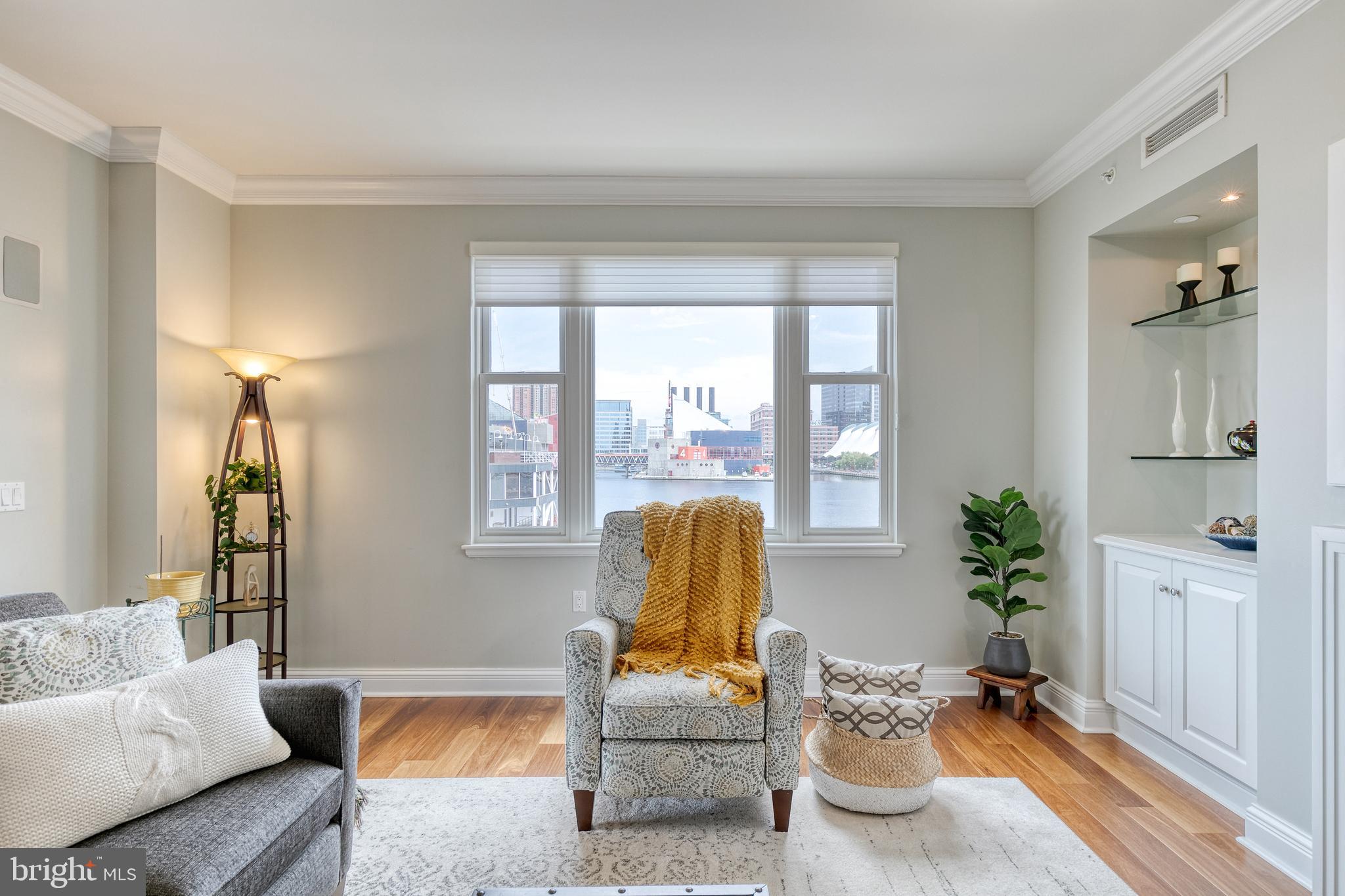 Highlighting the splendor expected within The Ritz-Carlton residences, welcome home to your mint condition two bedroom, two and one half bath residence. Pass through the semi-private elevator into your private marble floored foyer adjoining the separate laundry room with butlers pantry. The numerous windows shining natural light on pristine hardwood floors, you're welcomed home into open floor plan luxury. Walking into the family room & living room combination the waterfront view is on full display from every angle. Entertain family and friends in the chefs kitchen with eat in kitchen space separate from the larger more formal dining room. Enjoy cooking with two full size refrigerators, large wall oven, and separate 5 burner gas range. Luxuriate in the primary suite containing a large built in dresser, oversized walk-in closet, and water views. Relax in the spa style bathroom with separate vanities, jetted tub, rain shower, and designer marble tiling. The relaxing living style doesn't end inside this residence, take advantage of the Twenty-Four hour concierge, valet, movie theater, indoor heated pool, and many more amenities. This residence is in mint condition and being the best value within The Ritz-Carlton Private Residences this is the opportunity you've been waiting for!