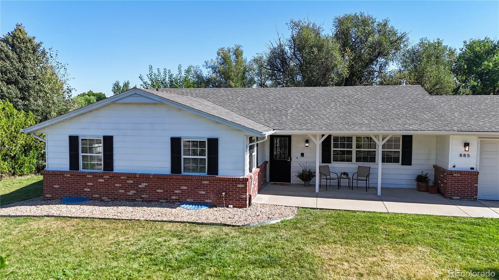 Buyers, be prepared to fall in love! This beautiful ranch-style home offers the perfect blend of modern updates, spacious living, and unbeatable functionality. Step inside to find a bright, open-concept layout where the remodeled 2025 kitchen shines with new quartz countertops, new cabinetry, matching stainless steel appliances, a wine/beverage refrigerator, and a large island that flows seamlessly into the dining and family rooms. Family and friends can gather around the cozy wood-burning fireplace or step through the sliding doors to the covered back patio, that is perfect for entertaining. The main level also features 3 bedrooms and 2 bathrooms, including a spacious primary suite with a walk-in closet and 5-piece ensuite bath. New LVP flooring spans the kitchen, dining area, family room, and guest bath, while carpet provides comfort in the bedrooms. An abundance of natural light creates a warm and welcoming feel throughout. The basement has a finished laundry room that includes a newer utility sink, a nicely finished ¾ bathroom, and a huge storage/utility room with a new water heater. The unfinished portion of the basement is ready for your vision—add a 4th bedroom, office, home gym, media room, or rec space. Car enthusiasts and hobbyists will love the custom, hard-to-find 4-car garage and workshop! The oversized driveway has ample room to park an RV/Camper or boat. This home is set on a large lot that backs to a walking path and canal creating additional peace and privacy in the backyard. The Northwest Open Space, local trails, parks, restaurants, shops, and I-25 are all easily accessible. This home truly has it all—modern updates, endless functionality, and plenty of room to relax and enjoy pursuing your favorite hobbies. Don’t miss your chance to make it yours!