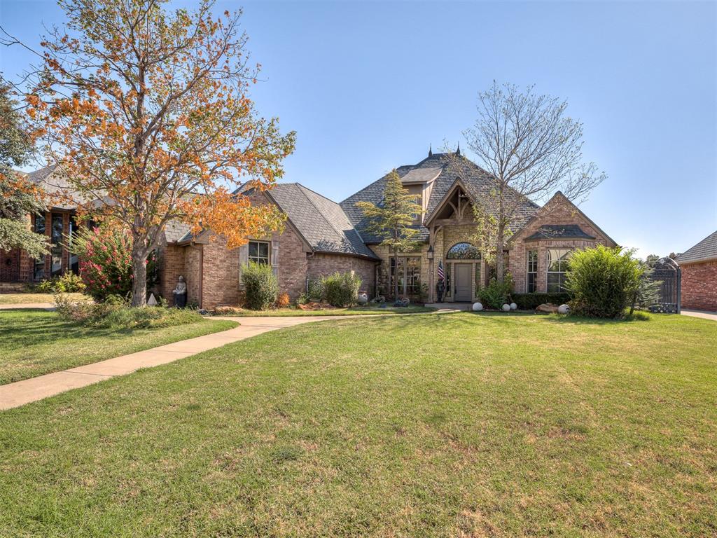Beautiful home to say the least.  This is an Arron Tatum home built with quality. Home has hardwood floors, carpet and brick flooring PLUS crown molding and solid core interior doors. Open concept with fireplace, living area and spacious dining area.  Large office with built-in bookcase and desk.  Large island in kitchen with extra storage space, wine storage cabinetry and pantry.  Primary bed/bathroom was redone in 2018 with a soaking tub, large closet with built-ins and door leading to back patio. AMAZING FEATURES include laundry room with sink; adjoining bathroom that has 2 different vanities for each of the two bedrooms and share the tub/shower and commode area. Each of these bedrooms have walk-in closets.  Home features upstairs theater room with projector screen and theater seats PLUS additional space for a pool table,  etc. Shutters on the front windows and in the west bedroom. Recent heat and air system for southside and main areas in 2020.  Home also features a very nice inground pool with slide and a great patio for those wonderful evenings.