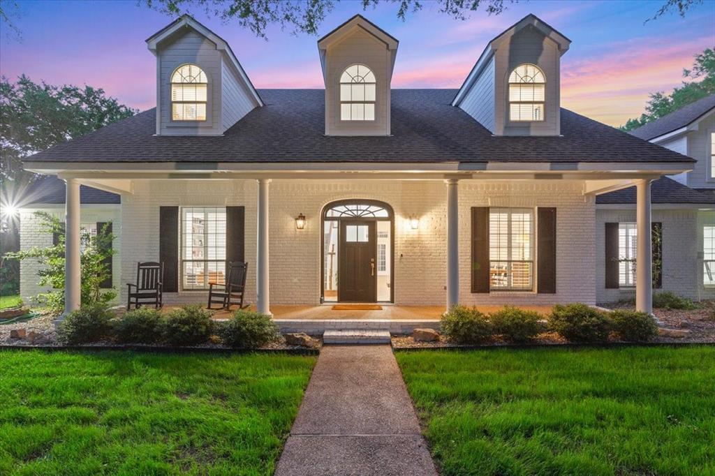 Tucked away on a quiet 1.9-acre cul-de-sac lot in Hidden Valley and surrounded by mature trees and forest, 1061 Hidden Valley Court offers rare privacy with exceptional space and upgrades throughout. Recently remodeled, this home features an open-concept main living area anchored by a chef’s kitchen with a large center island, a six-burner stainless steel range, new cabinetry, and Taj Mahal quartzite countertops. The main level also includes a breakfast space, a formal dining room, and a second formal living area. Additional downstairs highlights include a walk-in pantry with quartzite counters and open shelving, an executive office, an oversized utility room, and a fifth bedroom currently used as a workout room. The isolated primary suite features a spacious walk-in closet, dual vanities, a garden tub, a tiled shower, and private access to the back patio, which is wired for a hot tub. A recent addition above the garage provides a third living area, ideal for recreation or media space, along with an oversized bedroom and full bath with hall access. Upstairs in the original portion of the home are two additional bedrooms, each with its own en suite bathroom, plus an additional living space dedicated to these bedrooms. The backyard is a true retreat, featuring an extended patio, a recently built swimming pool with a tanning ledge, and a guest house with a kitchen, full bath, and living and sleeping areas. Additional amenities include a circular drive, an extended driveway, an expanded three-car garage with workshop potential, a 50-amp 240-v car plug-in in the garage, a propane tank for appliances, updated lighting, and luxury vinyl plank flooring. Located in Midway ISD, this property offers 5+ bedrooms, multiple living areas, 5+ bathrooms, and unmatched privacy in Hidden Valley. Schools: South Bosque, River Valley Middle School, and Midway High School.