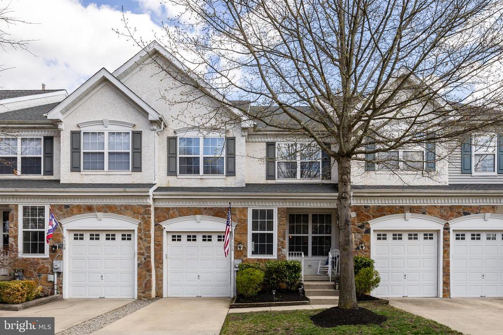 Welcome to 106 Weaver Dr, a spacious 3-bedroom, 2.5-bath townhome in the desirable Tanglewood community! This light-filled home features an ideal layout perfect for both everyday living and entertaining. The main level boasts elegant hardwood flooring, creating a warm and inviting atmosphere throughout with a living room and formal dining area with leads to the soaring 2 story family room with gas fireplace and eat in kitchen with an abundance of white cabinetry, granite counters, tile backsplash and stainless steel appliances. The kitchen also provides access to the stamped concrete patio and fenced backyard providing a great space for outdoor living. There is a conveniently located powder room on the main level as well.Upstairs hallway and the spacious primary suite boast hardwood flooring, with the owner's suite providing a private bath with double vanity and garden tub as well as ample closet space. Two additional generous sized bedrooms, a full bath and laundry room complete the upper level.Other valuable features include a newer roof (2023), one-car garage with smart remote access adds convenience and modern functionality, recessed lighting,Located close to major routes, shopping, dining, and within a highly regarded school district, this home combines comfort, style, and an unbeatable location. Not to be missed!