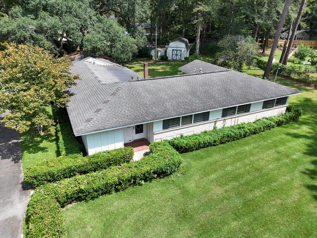 Classic home in a wonderful neighborhood! Don't miss 404 Glen Arven Dr. in Thomasville GA! This 3BR/2.5Bath home has all the room you will need. There is a huge living room, formal dining room and parlor, all with nice built-in cabinets and shelving. There is a cute kitchen with breakfast area and tons of counter space. The primary suite features a bathroom, walk-in closet and dressing room. There are also two nice rooms at the front of the home that can be used for home office, rec room, and MORE! Outside there is a fantastic sitting area with fireplace, big outbuilding and great backyard shaded by a beautiful oak tree. There are so many possibilities with this home. Call your favorite agent TODAY for a closer look! Click here for virtual tour: https://my.matterport.com/show/?m=B6abdsweXRB&mls=1