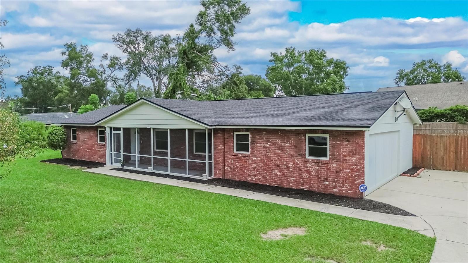 Welcome home to 1905 Bryan Road, a beautifully updated retreat sitting on nearly half an acre with no HOA and no CDD fees — the freedom to truly make it your own.Step inside and feel the difference every recent upgrade makes: brand-new flooring flows throughout, new windows and sliding glass doors fill the home with natural light, and the updated kitchen shines with new appliances and granite countertops. Two brand-new high-efficiency A/C units and a brand-new roof mean the big-ticket items are already taken care of, so you can simply move in and enjoy. Tax records reflect 1,298 sq ft, but this home offers even more living space to love — approximately 500 additional square feet of finished, air-conditioned space (buyer and buyer's agent to verify) featuring a spacious primary bedroom retreat, a versatile bonus room perfect for a home office or playroom, and the convenience of an inside laundry room.Outside, the possibilities keep going — plenty of room to garden, entertain, or park an RV, thanks to a dedicated 50-amp electrical hookup. A whole-home water filtration system adds everyday peace of mind.Ideally located, this is a home that's been thoughtfully cared for and is ready for its next chapter. Come see it for yourself — you won't want to leave!  You'll love how central this location feels — I-75 is just a quick hop away, putting downtown Tampa, MacDill AFB, and the airport all within easy reach, while beach days on the Gulf Coast are a straightforward drive.