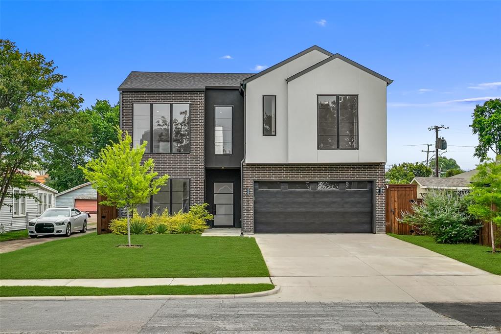 Discover contemporary elegance in this stunning new construction located in the heart of Dallas. This sleek two-story home boasts a seamless blend of modern architecture and luxury finishes, featuring a striking black and white façade that exudes sophistication. Inside, expansive windows fill the space with natural light, highlighting the open-concept layout and high-end details. The gourmet kitchen is equipped with premium appliances and stylish cabinetry, perfect for culinary enthusiasts. Upstairs, the spacious primary suite offers a tranquil retreat with large windows and a spa-like bathroom. Additional bedrooms are generously sized, ideal for family or guests. Outside, the landscaped yard provides a serene escape, with lush greenery and modern lighting. A two-car garage completes this beautiful home. Located close to vibrant dining, shopping, and entertainment, this property combines style, comfort, and convenience in one remarkable package.