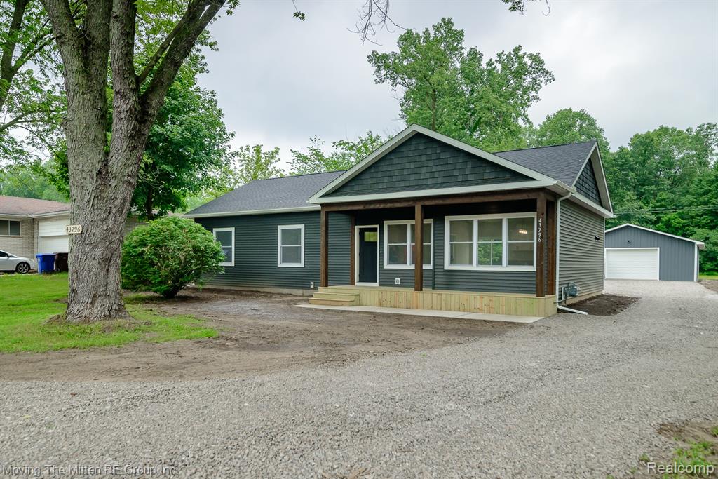 ***OPEN HOUSE SAT 6/28 NOON-2PM***IMMEDIATE OCCUPANCY available in this "nearly new-construction" home!  Rebuilt from the ground up in 2025, you can move into this new construction home without the large deposits and months of waiting!  This ranch home boasts NEW EVERYTHING: roof, siding, windows, walls, flooring, HVAC, kitchen, baths and so much more!!  Nestled on 2 1/2 acres, this 3 bed, 2 bath home features soaring cathedral ceilings, open concept floorplan, granite kitchen with island, first floor laundry/mudroom and a main floor primary suite with ceramic bath and closet!  Whether you prefer to enjoy a coffee on the covered front porch or dinner al fresco on the spacious back deck, the outdoor spaces on this home will WOW you!  And don't forget the 40x30 pole barn with concrete floors, electrical and an 8 ft overhead door for those gearheads!  County living with modern conveniences of city water, natural gas and paved road!  This one is a 10 and will go fast! Buyer to verify future taxes.