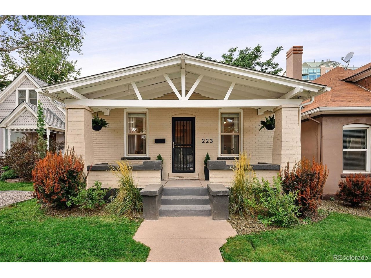 A quiet urban oasis in the heart of Denver, this charming 1905 bungalow offers a rare combination of character, privacy and convenience. The inviting covered porch overlooks a landscaped front yard, while fresh interior and exterior paint, refinished hardwood floors, new carpet and abundant natural light make the home truly move-in ready. Kitchen appliances, tile and bathroom finishes were recently updated (2022), and main-floor laundry adds everyday ease.The partially finished lower level provides flexible bonus space and generous storage. Outside, the fully fenced yard features low-maintenance turf, room to garden and sprinklers in the front and side yards. A one-car detached garage and two additional off-street spaces with alley access provide a coveted level of private parking.Situated on a peaceful residential block with direct northbound access to Speer, but no southbound turn from Speer onto Pearl, the home remains quiet while offering exceptional city access. Downtown, the Cherry Creek Trail, beloved Washington Park, the West Wash Park Community Garden, Restaurant Olivia, and some of Denver's best shopping and dining in Cherry Creek are all close at hand. Come make this quiet city retreat your home!
