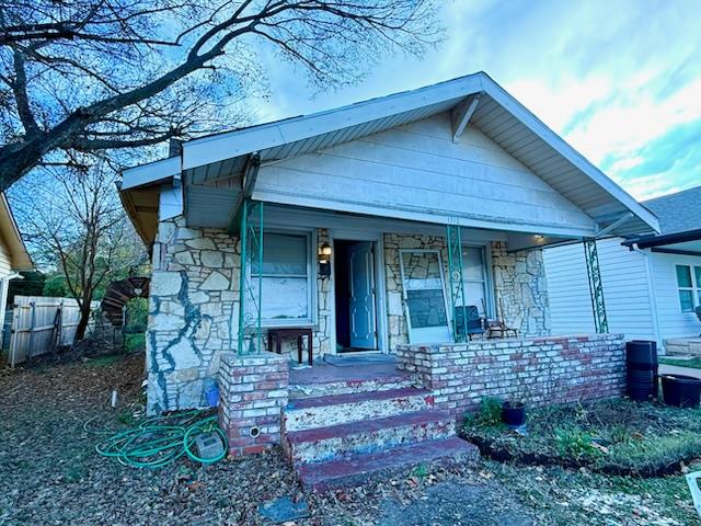 Endless possibilities await the next owner of this high potential, cute stone-siding home. Current layout is 3BR 1 Ba plus a >500sqft multipurpose room, but the home layout supports many configurations and even features a detached garage/shop. Look no further for your opportunity to own a home in one of the most sought after neighborhoods in OKC. Whether you want to turn this into your forever home with a little work or add this to your portfolio with a well performing short-term or long-term rental, the choice is yours. With new constructions happening down the street, opportunities like this don't come often in the neighborhood. Home to be sold as is.Listing agent (207757) is related to the seller and may have equitable interest in the home.