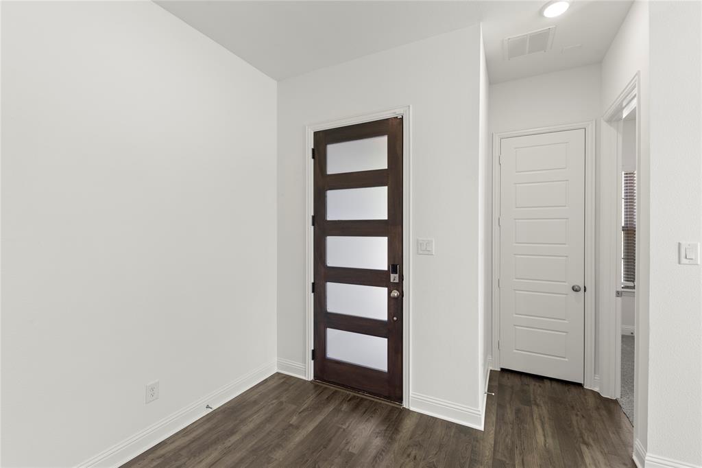 MLS# 21065890 - Built by Drees Custom Homes - Ready Now! ~ This modern townhome presents a spacious kitchen with vaulted ceilings that extend into the family and dining rooms. There is a lovely patio on the second floor along with the primary suite. This gives you two first floor bedrooms that are accompanied by a foyer and additional living space as you enter the home. This home is a must-see!