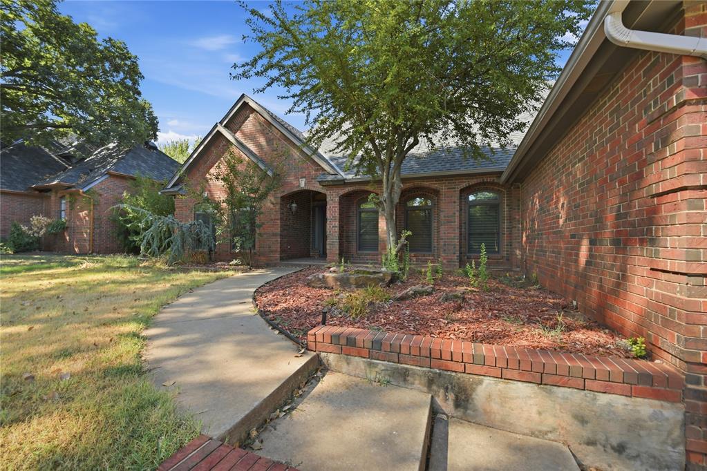***Spacious four bedroom, 2 1/2 bathroom home on a quiet cul de sac street***Large living room with fireplace and wood floors, ***Study overlooking front yard with plantation shutters, built-in bookshelves and desk***Formal dining area with plantation shutters***Remodeled kitchen with huge island, double ovens, pantry, built-in buffet and see through fireplace to living room***Primary bedroom features a second fireplace and a spa like bathroom with soaking tub, separate shower, dual vanities and large walk-in closet***Covered patio in backyard with tile flooring and two ceiling fans***Storm shelter in garage floor***Heat & air approximately one year old***Great location with easy access to Edmond and Oklahoma City***