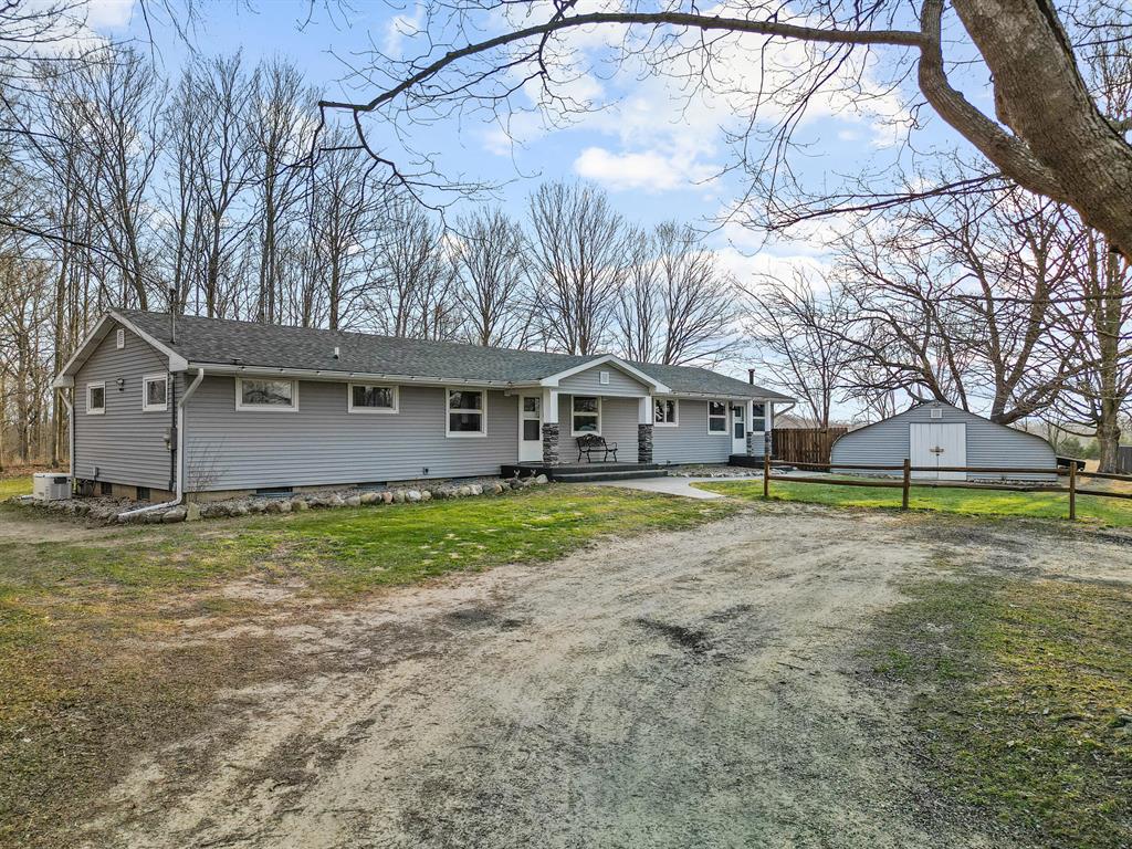 Nestled in the desirable Olivet School District, this charming ranch-style home offers the perfect blend of peaceful country living with beautiful updates--all set on 6.8 beautiful acres in a prime Charlotte location. Whether you're dreaming of a hobby farm or simply craving space and serenity, this property delivers. A stunning, brand-new 24x36 horse barn, large fenced pasture, and scenic walking trail create endless opportunities to enjoy the outdoors. Take in the picturesque views of wildlife, mature trees, and open land from the expansive 24x16 deck or the inviting concrete patio--ideal for relaxing or entertaining. The full basement is home to the laundry area and offers an abundance of storage space, with room to expand or finish to suit your needs, as it's already plumbed and ready for your ideas. In addition, a large storage shed provides even more space for tools, equipment, and extras--perfect for keeping everything organized.Additional highlights include a Generac generator for peace of mind, a new boiler, and a new concrete sidewalk. The attached greenhouse is ready for your personal touch--ideal for gardening, flowers, and anyone with a green thumb. With so many updates already completed, this move-in ready home allows you to immediately enjoy the beauty of country living--without sacrificing convenience, as you're just minutes from town. A rare opportunity to own a well-appointed property with acreage, charm, and endless potential--this is one you won't want to miss.