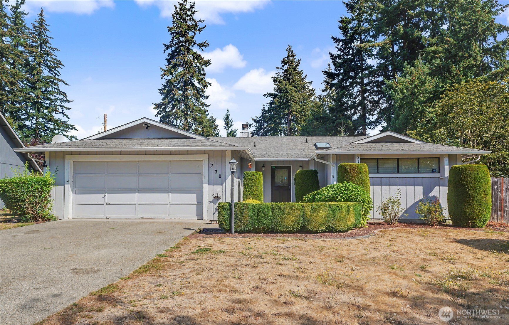 Well maintained 3 bed, 1.75 bath rambler located on a quiet cul de sac in Parkland. This 1,447 sq ft home offers a functional single level layout with a spacious living room with gas fireplace, dining area, and a separate family room with access to the deck. The updated kitchen includes granite countertops and good cabinet storage. The private bedroom wing features a full bath, two secondary bedrooms, and a primary suite with a ¾ bath.  Set on a large .25 acre lot, the fully fenced backyard provides ample room for gardening, play, and outdoor projects. Mature fruit trees, level topography, and an oversized deck create a versatile outdoor setting. Additional features include double pane windows, ceiling fans, forced air heating with heat pump cooling, and an attached two car garage. Shed offers added storage or hobby space. Convenient access to Pacific Ave, local services, and commuter routes. Home is easy to see!