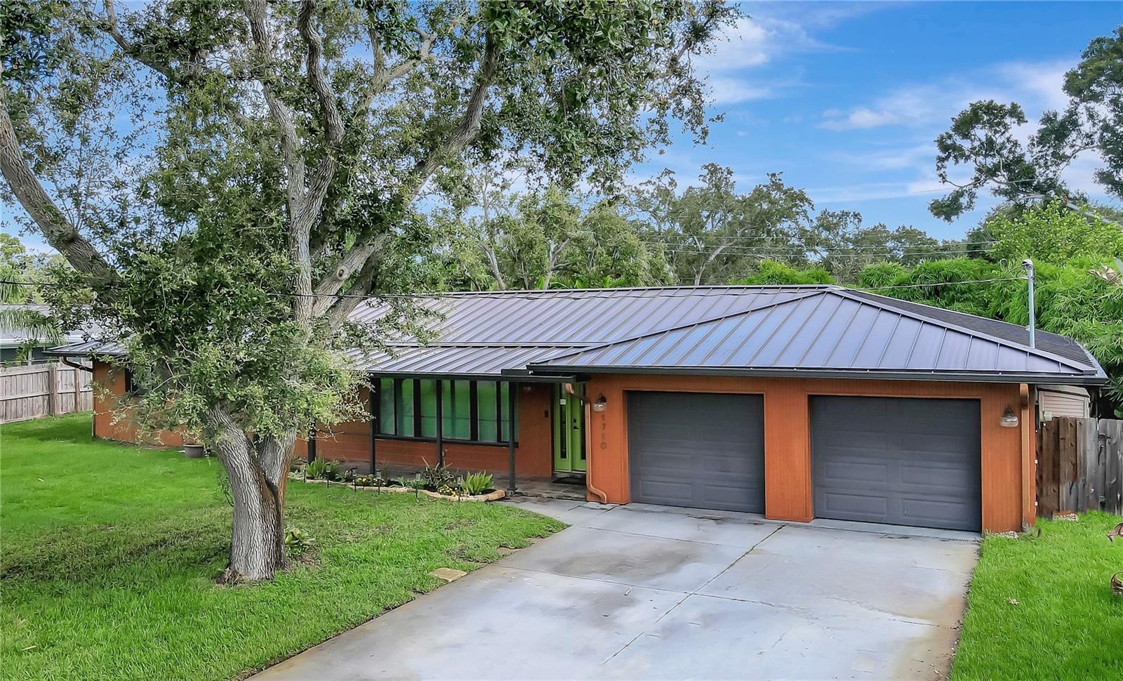 One or more photo(s) has been virtually staged. Pride of ownership shines throughout this beautifully renovated 3-bedroom, 4-bathroom pool home located in the heart of Clearwater. Designed with comfort and functionality in mind, the home offers a spacious, family-friendly open floor plan perfect for both everyday living and entertaining. Step into a bright and airy living room highlighted by large picture windows that fill the space with natural light. The chef’s kitchen is sure to impress with abundant counter and cabinet space, a full suite of stainless-steel appliances, and both an eat-in breakfast bar and cozy dining nook. The sun-drenched family room features French doors that open onto a generous pool deck and an oversized, fenced-in backyard, offering privacy and space to relax or entertain. The primary suite is a true retreat, overlooking a tranquil gazebo area ideal for morning coffee or quiet evenings. The ensuite bathroom includes dual vessel sinks and a custom walk-in shower. Additional features of this home include a full pool-accessible bathroom, a spacious laundry/mudroom with utility sink and cabinetry and an irrigation system powered by a deep water well, perfect for maintaining the lush, mature Florida landscaping. You will have peace of mind as all the major systems have been recently updated - metal, 100-year roof (2015), HVAC system, including new ductwork (2017), plumbing and electrical updates (2016) and double-paned, hurricane-rated impact windows and doors throughout. All of this and you are just minutes from shopping, dining, award-winning Gulf beaches, and have easy access to both Tampa and St. Pete International Airports. Don’t miss the opportunity to own this beautifully renovated retreat. Schedule your private tour today!