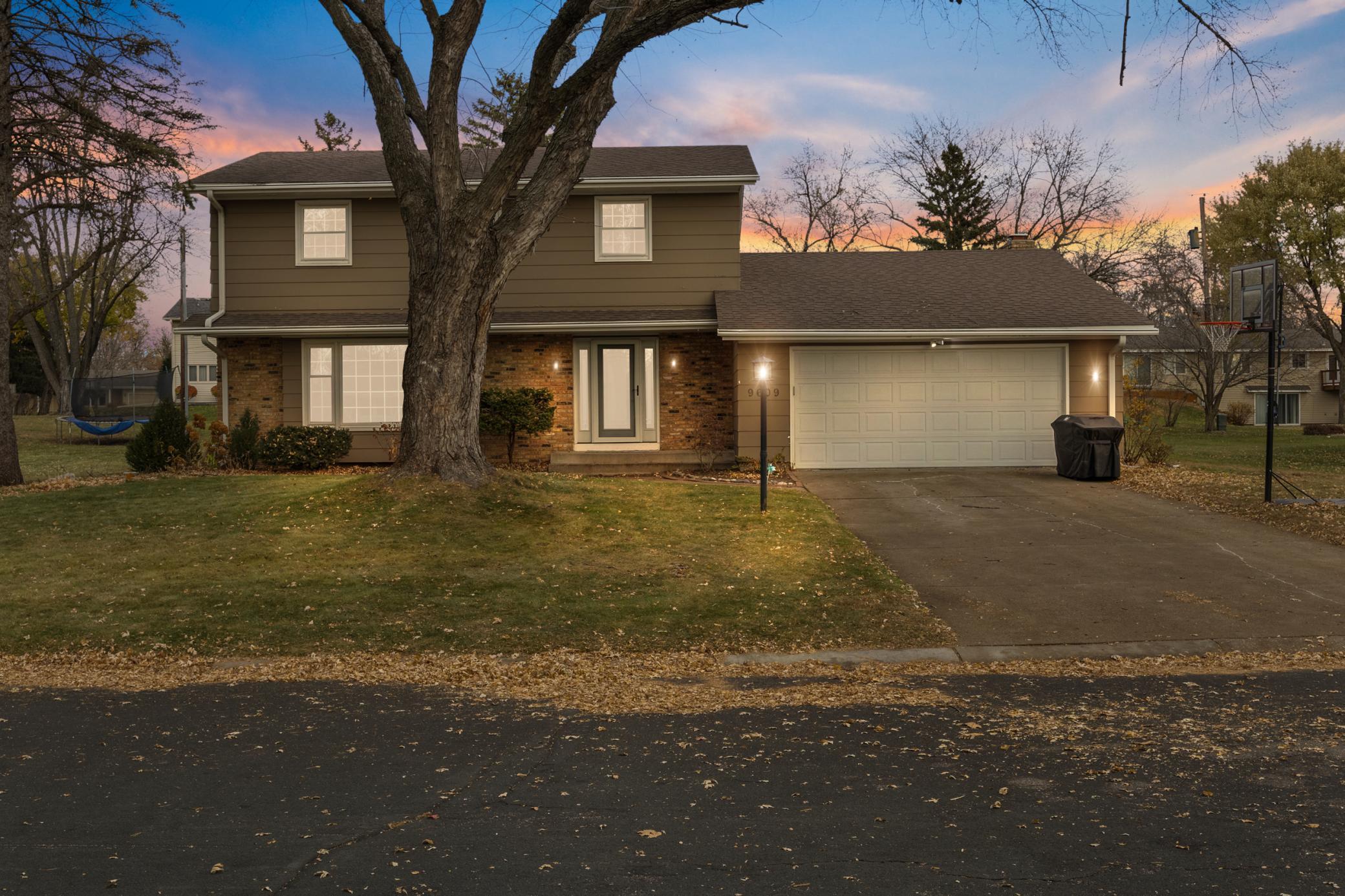 Discover this exceptional two-story home in the coveted Southbrook neighborhood of Bloomington. The heart of the home is a fully redesigned gourmet kitchen, featuring a large center island, high-end appliances, and ample space for cooking and gathering. This central space flows seamlessly into a comfortable family room and then extends to a delightful three-season porch, perfect for enjoying the outdoors. A rare and highly sought-after layout awaits upstairs with four spacious bedrooms, all conveniently located on the same level and boasting hardwood floors. The generous primary suite provides a private retreat, offering dual closets and its own beautifully updated 3/4 bathroom. The finished lower level adds even more flexibility with a large rec room and a fifth bedroom. Outside, the spacious, level backyard provides endless opportunities for recreation and gardening. Enjoy this fantastic setting just moments from the scenic trails and natural beauty of 9 Mile Creek.