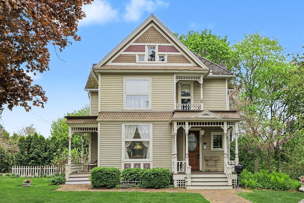 Welcome to a Victorian with personality to spare! This charming two-story home offers 4-5 bedrooms, nearly 2,600 finished sq ft, a walk-up attic, tall basement, and over 3/4 of an acre just steps from downtown favorites--farmers markets, Benny's Bakery, concerts, festivals, shops, and local pubs. Inside, original woodwork, pocket doors, antique fixtures, and vintage hardware bring the character to life. There's even a double staircase--because one just isn't as fun. The updated kitchen blends charm and function with honed granite counters, high-end appliances, and a gas range. The spa-like main bath features heated tile floors, a huge walk-in shower, and a separate clawfoot soaking tub room. Major updates include dual high-efficiency Carrier HVAC systems, newer water heater, and washer/dryer. Outside, enjoy a peaceful backyard retreat with hillside views, ferns, and visiting deer. Loved by only six owners since the 1800s--ready for lucky number seven!