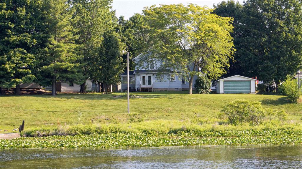Charming 3-Bedroom Lakefront Home on Devils Lake.  Enjoy year-round lake living in this beautifully updated 3-bedroom, 1-bath home located right on the shores of scenic Devils Lake. Step into a stylish, modern kitchen featuring Bluetooth-controlled lighting-ideal for hosting or creating a cozy ambiance. The freshly renovated bathroom offers both comfort and contemporary touches.  Relax in the heated lake view porch, perfect for morning coffee or evening sunsets, no matter the season. Outside, a spacious pole barn and shed provide ample storage for lake toys, tools, or hobbies. With easy access to US-223, you get the best of both worlds: peaceful lakeside serenity and convenient commuting.  Whether you're looking for a weekend retreat or a year-round residence, this lakefront gem has it all!