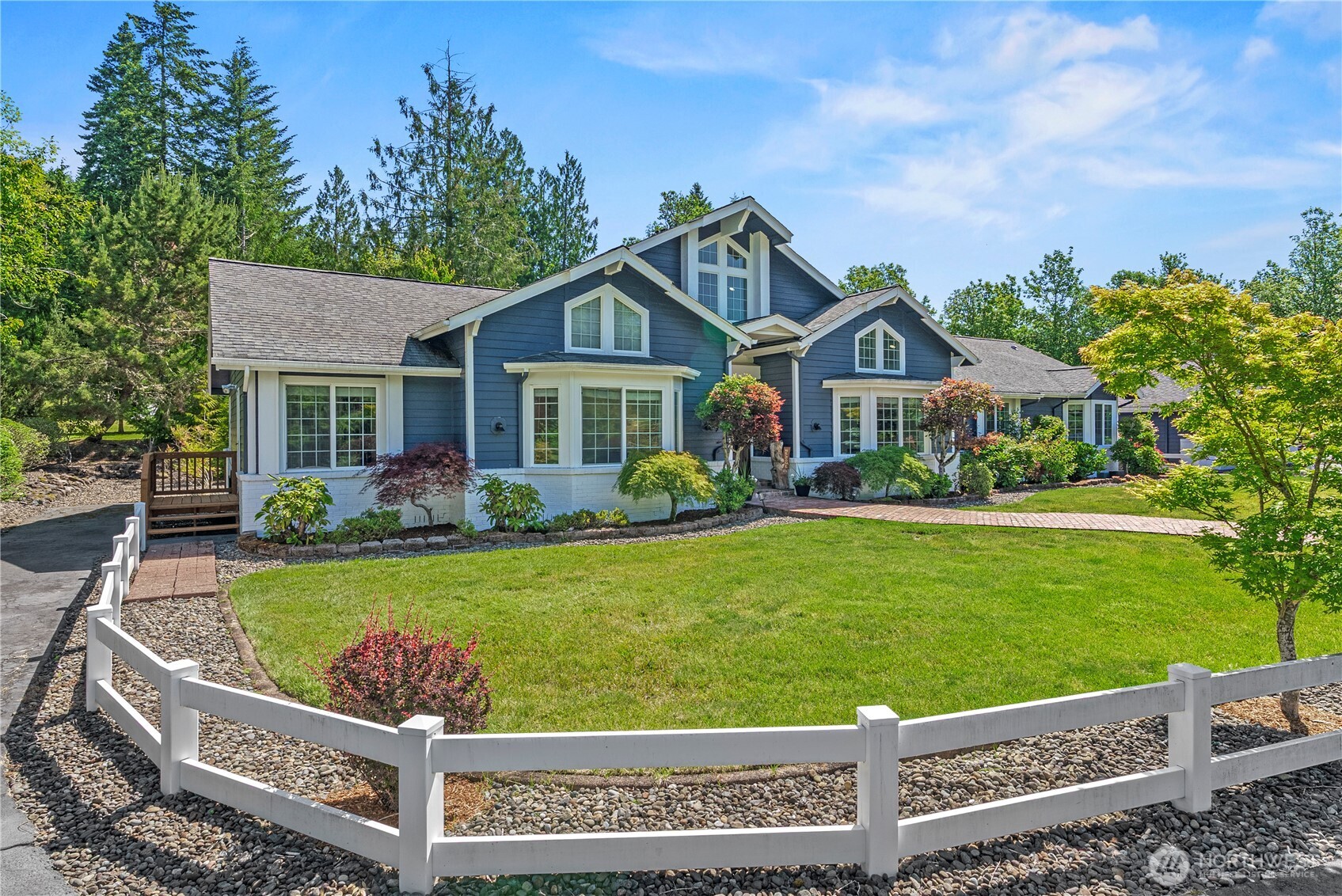 Welcome to your private country retreat on nearly 12 picturesque acres in Mossyrock on 2 tax parcels. This beautifully updated property offers the perfect blend of comfort, functionality, and versatility with a remodeled kitchen featuring new cabinetry, updated flooring, fresh paint interior and exterior, new lighting and more. Enjoy the multiple heating options, including heat pump, A/C, and wood heat.    Designed for equestrians, hobby farmers, and outdoor enthusiasts, the property features a six-stall barn, accommodations for horses and livestock, full RV hookups, gated entry, mature landscaping, and multiple outbuildings. The detached garage has been converted into a game room and bonus space, while additional garages and shop buildings provide abundant room for vehicles, equipment, and storage.    The home includes two primary suites, a total of 4 bedrooms, three bathrooms, a wood-burning fireplace, and a detached one-bedroom apartment with laundry, full bathroom, and separate electrical service—ideal for guests, multigenerational living, or rental potential. Additional features include radiant heated floors in the primary bath, a whole-property generator, security system hook-ups, and a private hot tub perfect for relaxing after a day spent enjoying the property.     Located just minutes from Mayfield Lake, Riffe Lake, boating, fishing, and year-round recreation, this rare property offers the space, amenities, and lifestyle you’ve been searching for.