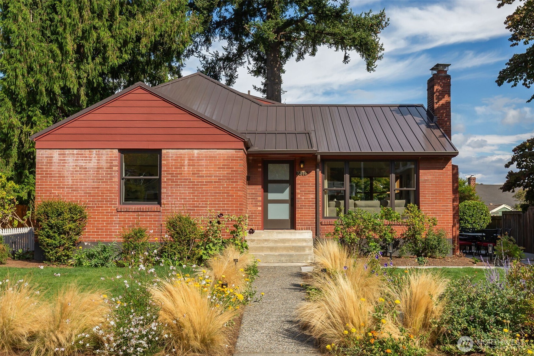 Some houses simply stand out and leave you thinking about all the possibilities — a unique design element, the quality of construction, or the intangible way it makes you feel. In the case of this solidly-built 5-bedroom View Ridge home, it's all of the above! Located on one of the best streets in the area (according to the neighbors!), it will win you over with its charming front and side gardens, timeless SHED Architecture–designed kitchen and primary suite, beautiful wood-wrapped windows, ductless geothermal heating system, metal roof, and remodeled lower level. Every space thoughtfully refreshed and in excellent condition under the care of diligent owners. This special place engages your senses through the touch of warm radiant floors throughout the main floor, kitchen and upper level; the smell of the meals yet to be cooked; & the plantings and natural light are a sight for your eyes. It IS the whole package. Extend the joy of living in NE Seattle with the transferable option of a View Ridge Swim & Tennis Club membership — a priceless perk limited to just 550 spots with a current 13-year waitlist. VRSTC has a year-round outdoor pool for swim team/lessons/water polo, along with tennis and pickleball courts, a clubhouse, and grounds with basketball and a playground. Appreciate buried power lines & close proximity to the Burke-Gilman Trail & Magnuson Park, plus easy access to bus lines serving Husky Stadium Station, UW Medical Center, and University Village.