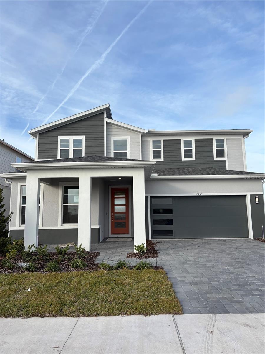 EverBe is a new master planned community where convenience and connections combine to create a new standard for home. Located in Orlando with quick access to 417 & 528, this lifestyle community will offer miles of pathways & trails, wi-fi-enabled green spaces, unique outdoor recreation areas, a fitness center, a clubhouse complex with resort pool, 2G internet, and a waterfront amenity and town center. Get excited for EverBe - everything home should ever be!Step into the Imperial by Pulte Homes, where luxury and convenience seamlessly combine to create a truly elevated living experience. This remarkable 5-bedroom, 3.5-bathroom home with a 2-car garage offers unparalleled craftsmanship and thoughtful design throughout. The open-concept layout flows effortlessly, creating an expansive, airy feel that exudes both sophistication and comfort. On the first floor, discover a private en suite bedroom with a walk-in closet and elegant quartz countertops—a perfect retreat for guests. At the heart of the home, the chef-inspired kitchen is a true masterpiece, featuring 42” soft-close cabinetry, striking quartz countertops and decorative tile backsplash. Whirlpool stainless steel appliances, including a built-in cooktop, make cooking a pleasure. The kitchen seamlessly connects to the café and gathering room, where a sliding glass door opens to the covered lanai, enhancing the flow of indoor-outdoor living. The first floor also offers a convenient powder room, perfect for guests. Upstairs, the luxurious owner’s suite is a private sanctuary, featuring a spacious walk-in closet and a spa-like en suite bathroom with quartz-topped dual vanity sinks and a frameless glass enclosed shower. The loft area provides the perfect space to unwind, while three additional bedrooms and a bathroom complete the upper level. For added convenience, a thoughtfully located upstairs laundry room simplifies everyday tasks. Beautiful tile flooring is found throughout the main living areas of the first-floor, bathrooms and laundry room, while plush, stain-resistant Shaw carpet can be found throughout the bedrooms, loft, and staircase. Designer-curated finishes elevate every corner of this home, including pendant light pre-wire, epoxy finished garage floor, wrought iron basket balusters with oak handrail at the staircase, and comfort height toilets enhance the home's style and comfort. This home is equipped with a smart thermostat, smart doorbell, surround sound pre-wire, digital IP camera pre-wire, and LED downlights, ensuring your home is as connected as it is beautiful. This home offers the perfect combination of luxury, convenience, and modern design—an ideal place to live and relax. Schedule a tour today!