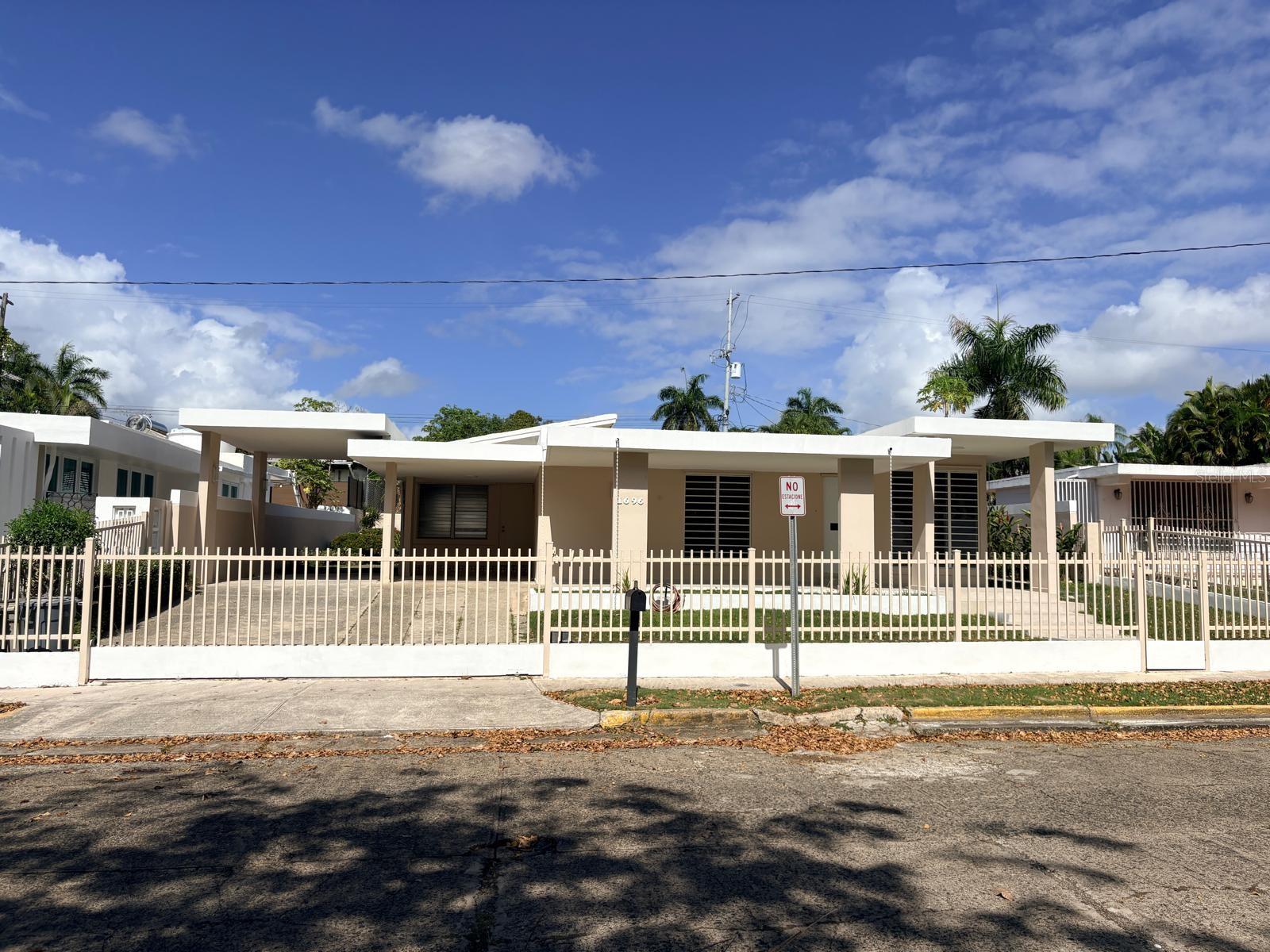 **Exclusive Turnkey Residence in San Ignacio Urbanization**An exceptional acquisition opportunity in one of San Juan's most established communities, adjacent to Santa María and San Francisco. Located at 1696 Calle San Cosme, this single-story, single-family residence seamlessly blends a strategic location, efficiency, and pristine move-in-ready condition.The home features 1,569 square feet of gross living area (GLA) distributed across 4 bedrooms and 2 full bathrooms, set on a level 600-square-meter lot (0.148 acres / 6,458 SqFt).**Key Features & Recent Upgrades:*** Fully repainted (interior and exterior).* Recent roof sealing and protective treatment.* Completely upgraded lighting system.* Includes major appliances and 5 high-efficiency inverter air conditioning units.**Investment & Lifestyle Profile:**Ideally suited for first-time buyers seeking a property without incurring immediate remodeling costs or delays, as well as buyers looking to downsize and simplify their lifestyle by reducing exterior maintenance expenses—all while enjoying a generous lot and the exclusivity of a premier San Juan neighborhood.