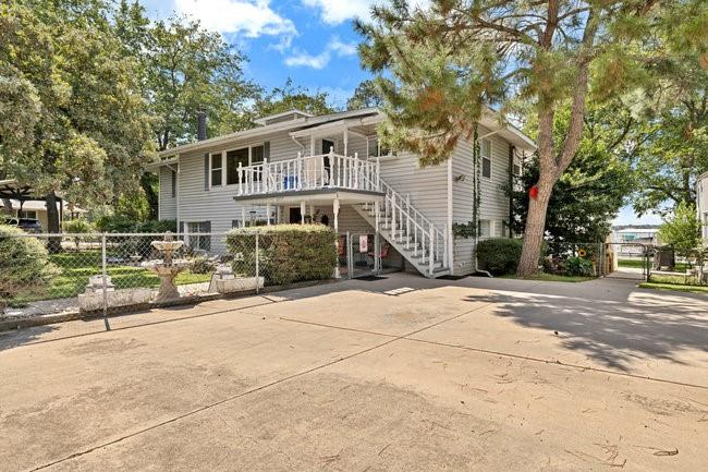 Lakefront Living at Its Finest 4BR 3.5BA with Private Dock & Sunset Views

Welcome to your dream lakefront retreat! This stunning 4 bedroom, 3.5 bath home offers 3,296 sq ft of well-designed living space and sits on a 165-foot private shoreline, providing breathtaking water views from nearly every room.

Enjoy the outdoors year round with a spacious balcony and covered porch overlooking the lake, the perfect spot for morning coffee or soaking in the unforgettable sunsets. A 2 slip dock with lifts makes boating and lake adventures effortless.

Inside, the home boasts ample space for both relaxation and entertaining. While the 2 car garage, 2 car carport, and expansive driveway parking offer plenty of room for guests, vehicles, and lake toys.

Whether you're hosting weekend getaways or looking for a peaceful place to call home, this property delivers the best of lakefront living, privacy, space, and unbeatable views.

Don't miss this rare opportunity to own a slice of lakefront paradise!