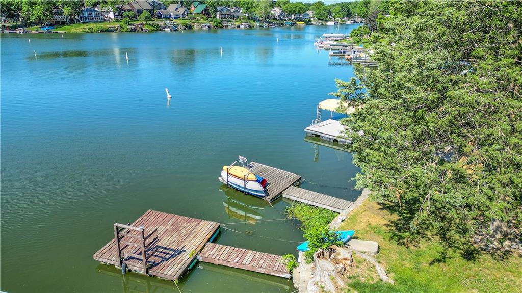 Lake Tapawingo Ranch Living. Tons of parking on the property, unusual.  Bedrooms and Laundry on the Main Floor.  Zero entry into front door.   Ready to boat and have fun at the Lake?  You have found your home.  Completely updated, move in ready.  Enjoy a relaxing day on the front porch, the two tiered back patio deck or your private dock.  Enjoy water sports on this lake.  Open Concept floor plan with beautiful newer kitchen.  View of lake from your deck or kitchen. Tons of storage in all closets. Very short walk to the dock.  Kayak rack stays with the dock.  All appliances stay with home including refrigerator washer and dryer.  Community feel and warm neighbors.  Constant events if you enjoy groups.  Night kayaking is beautiful on the lake.  Trails for walking or bicycling.  Need an at home office? ... many choices. Lake Tapawingo is approximately 289 acres and has approximately 850 homes. Tons of storage in all closets.  Enjoy vacation on a daily basis at this beautiful move in ready home. Summer is here and this home has your name on it.
Invasive Species training is a class the Country Club provides free of charge to all residents. It is held the third Saturday of each month at 9:00 am at the Country Club office. The class goes over the different invasive species of animals that can invade our lake and how we as a community have put rules in place to keep that from happening. The rules state each household must send at least one member to invasive species training every two years in order to gain and keep lake privileges.
Our next class would be June 21, 2025.