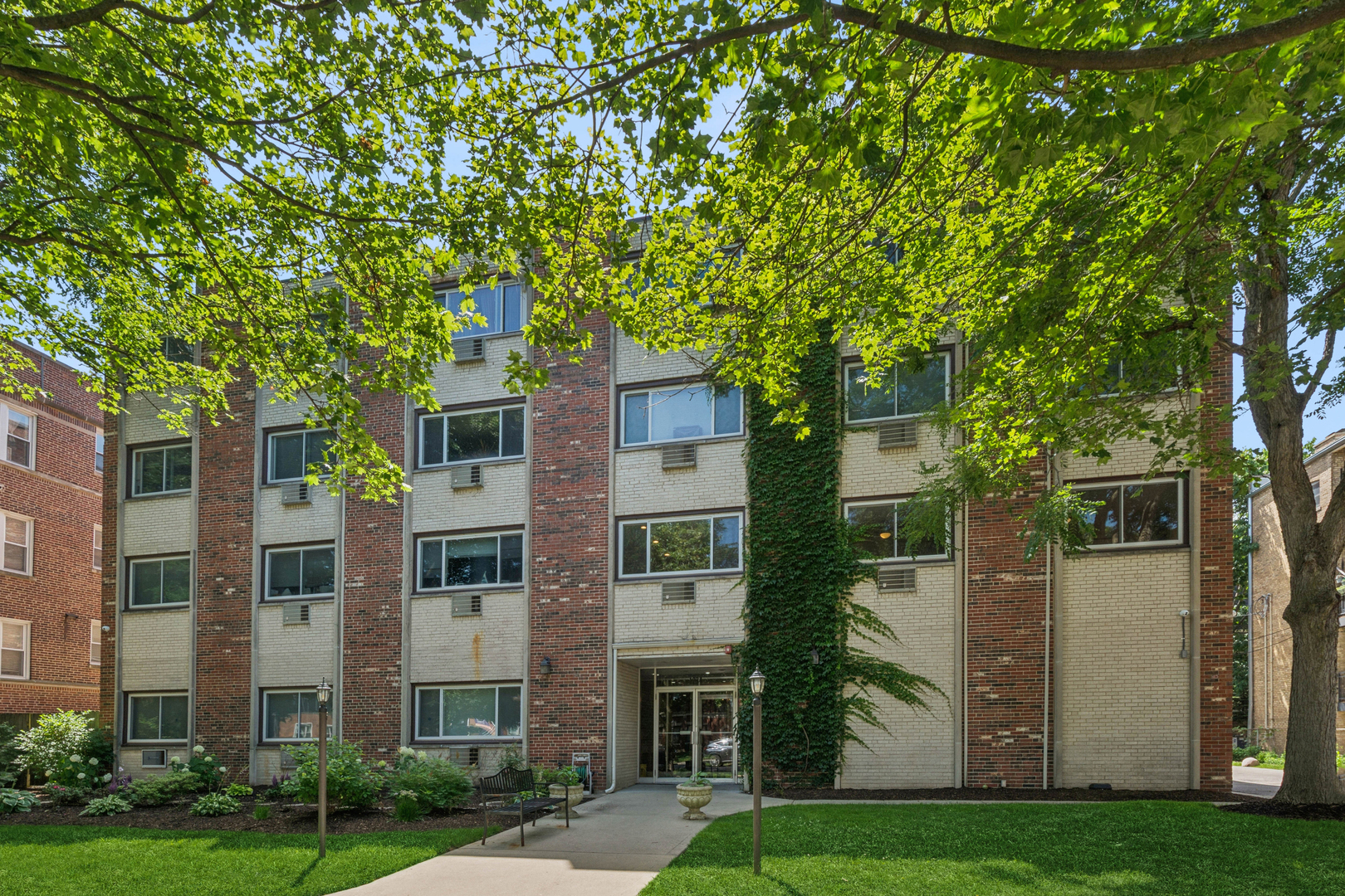 Newly updated and perfectly located, this oversized 3-bedroom, 2-bath condo offers the comfort and space of a single-family home! The beautifully remodeled kitchen features updated cabinetry with a pantry, granite countertops with abundant prep space, a stylish newer backsplash, luxury vinyl plank flooring, and newer stainless steel appliances. The kitchen opens seamlessly to the expansive living and dining area, complete with newer recessed lighting and plenty of room to accommodate a large dining table - ideal for everyday living and entertaining. Both bathrooms have been thoughtfully renovated with modern tile surrounds, updated vanities, lighting, toilets, and exhaust fans with built-in Bluetooth speakers. The spacious primary suite offers a private ensuite bath and an oversized walk-in closet outfitted with custom organized shelving. Additional improvements include updated electrical, newer air conditioning units, newer ceiling fans, generous closet space throughout, and one covered garage parking space included in the price. The beautifully landscaped common yard provides a welcoming outdoor retreat. This well-maintained elevator building offers outstanding amenities, including a game room, additional storage locker, free laundry on every floor, and the option to install in-unit laundry for added convenience. Dog friendly building! Dewey and Nichols School Districts! Enjoy an unbeatable location just minutes from the CTA Purple Line and Metra, as well as Jewel-Osco, Trader Joe's, Binny's, and an abundance of shopping, dining, parks, and entertainment. Move right in and enjoy stylish, low-maintenance living in one of the area's most convenient locations - come see it before it is gone!