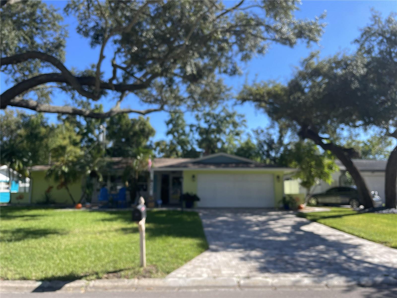 Coming Soon —990 Lexington Dr. Offering walkability, convenience, and the charm of one of Dunedin's most desirable neighborhoods. Over a half-acre, greenbelt, hurricane windows, hot tub, steam room and more. Professional photos, video, 3-D tour and full details will be available at launch. Showings begin Thursday, 10/1.