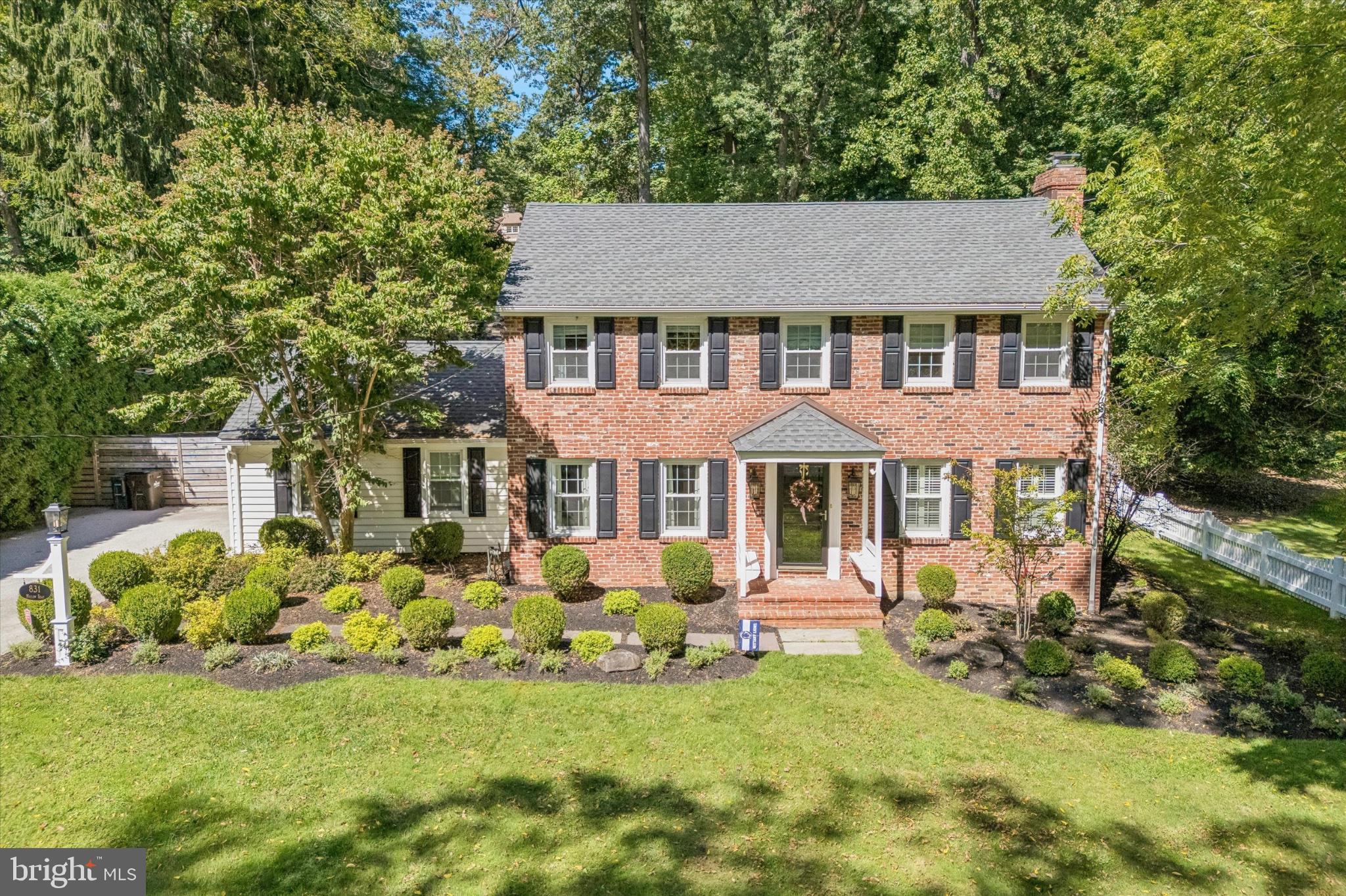 OPEN HOUSE CANCELLED - OFFER ACCEPTED!  Welcome home to 831 Hollow Road. This thoughtfully updated 4-bedroom, 3.5 bathroom home is situated on a well-appointed lot within the highly-ranked, TE School District. 831 Hollow Rd strikes an intentional balance of high-end design with a warm, inviting feel. The spaces are polished but comfortable, with quality materials and custom details throughout.As you enter through the front doors of the home, you will immediately notice the love and attention to detail here. The main floor is designed for both everyday living and hosting friends and family. Hardwood floors, Baldwin solid-brass knobs, custom Roman shades and curtains, and Rejuvenation lighting run throughout the home, creating an elevated, cohesive feel from room to room.The oversized living room is the perfect gathering space and currently has a dedicated play area. This room features a fireplace, plantation shutters, and recessed lighting. Heading across the hall, you will find the stunning formal dining room that is wrapped in North + Finch wallpaper and flows perfectly into the heart of the home: the kitchen. The kitchen is truly the perfect space for gathering both with guests for entertaining or just for the ease of everyday living. This updated space is airy and welcoming, with Monogram stainless-steel appliances, a peninsula island, and a sun-soaked eat-in banquette that overlooks the backyard.Just off the main living spaces is a versatile, large room that is currently being used as an office. This room is fit with wall-to-wall custom built-ins, a large closet for storage, and previously served as a first-floor bedroom to prior owners.The first floor is finished with a breathtaking powder room freshly wallpapered in Sandberg, with a classic pedestal sink and Rohl faucet.Upstairs, the spacious primary bedroom features custom built-ins by Legacy Wardrobes and a newly renovated primary bathroom with Moen plumbing fixtures, double vanity, Carrera marble, and a skirted toilet. This floor also features two large, additional bedrooms, one with a new custom built-in wadrobe. The current owners added an additional room on this floor that is currently used as a nursery and could be easily used as an office. This room was thoughtfully designed with a built-in wadrobe, custom Pepper Home roman shades/curtians, and yes, it could even fit a twin-bed! Finishing out this floor is an updated full bathroom. The newly redone basement adds valuable finished space for whatever your family needs—whether as a playroom, guest space, home office, or additional living area. This level also includes an updated full bathroom and ample unfinished storage space.Outside, the refinished flagstone patio opens to a fully fenced backyard, while the newly fully-fenced front yard (with a driveway gate) provides additional useable yard space. Don't forget to check out the oversized, two-car garage before you go!This thoughtfully updated home combines beautiful design with flexibility and functionality. With well-designed spaces, generous storage, flexible rooms, and a considered collection of finishes throughout, this is it. Welcome Home...this won't last!