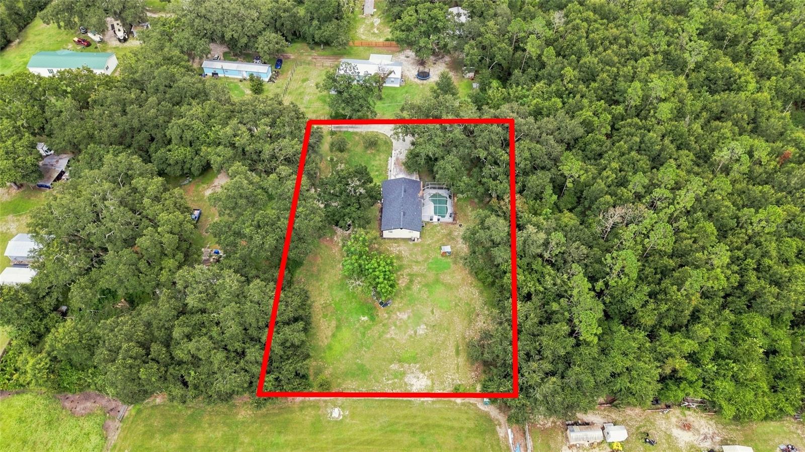 Escape to nearly an acre of pure privacy in Plant City, without sacrificing convenience! This 2-bedroom, 2-bathroom block home provides the perfect blend of peace and practicality, featuring a sparkling in-ground pool for endless Florida afternoons. A 3rd bedroom is already underway, the work has started, so it just needs final finishes to complete, adding even more value and flexibility. Recent big-ticket upgrades give you peace of mind: roof, AC, and water heater ALL replaced in 2021. The kitchen shines with sleek quartz countertops, and RV hookups make this property ideal for hobbyists, weekend explorers, or extra-parking needs. Enjoy the tranquility of a spacious, private lot while staying just minutes from shopping, dining, and entertainment. This is Florida living at its most flexible, schedule your showing today!