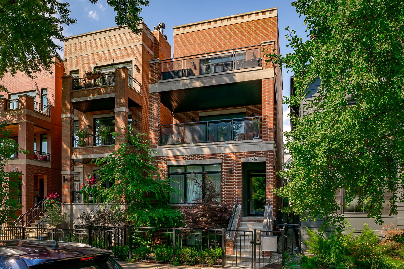 Newer 2020 QUALITY construction designer home awaits you! This penthouse unit complete with PRIVATE ROOFDECK is ideally located on cusp of Lincoln Park and Lakeview. Luxury finishes throughout; solid brick exterior, 3.25" oak hardwood floors, high-end appliances (2020), quartz countertops, custom closets, custom millwork, surround sound capabilities, and more! Gourmet kitchen is made for entertaining with an oversized island, Wolf stove top, custom cabinetry that extends to the ceiling, and designer light fixtures.  The open floorplan, flows into the living room complete with gas fireplace, and dining room showcasing embossed designer wallpaper for an understated wow factor. Looking for outdoor space? This home features a MASSIVE Eastern exposure terrace (9'x18'!), complete with gas line for grilling, overlooking tree-lined street (great for privacy).  Make the most of the dog days of summer on your personal tiled roofdeck complete with both gas & water lines for a firepit & more - enjoy as-is, or make it the oasis of your dreams.   Primary en-suite features walk-in closet, and heated floors, dual vanity, herringbone tile work, and oversized steam shower in the bathroom. Access in hall (not bedroom) to the detached all brick garage with one parking space included in price (northernmost). There is also a personal storage closet for your overflow items in the back of the building. Nothing to do but MOVE RIGHT IN!