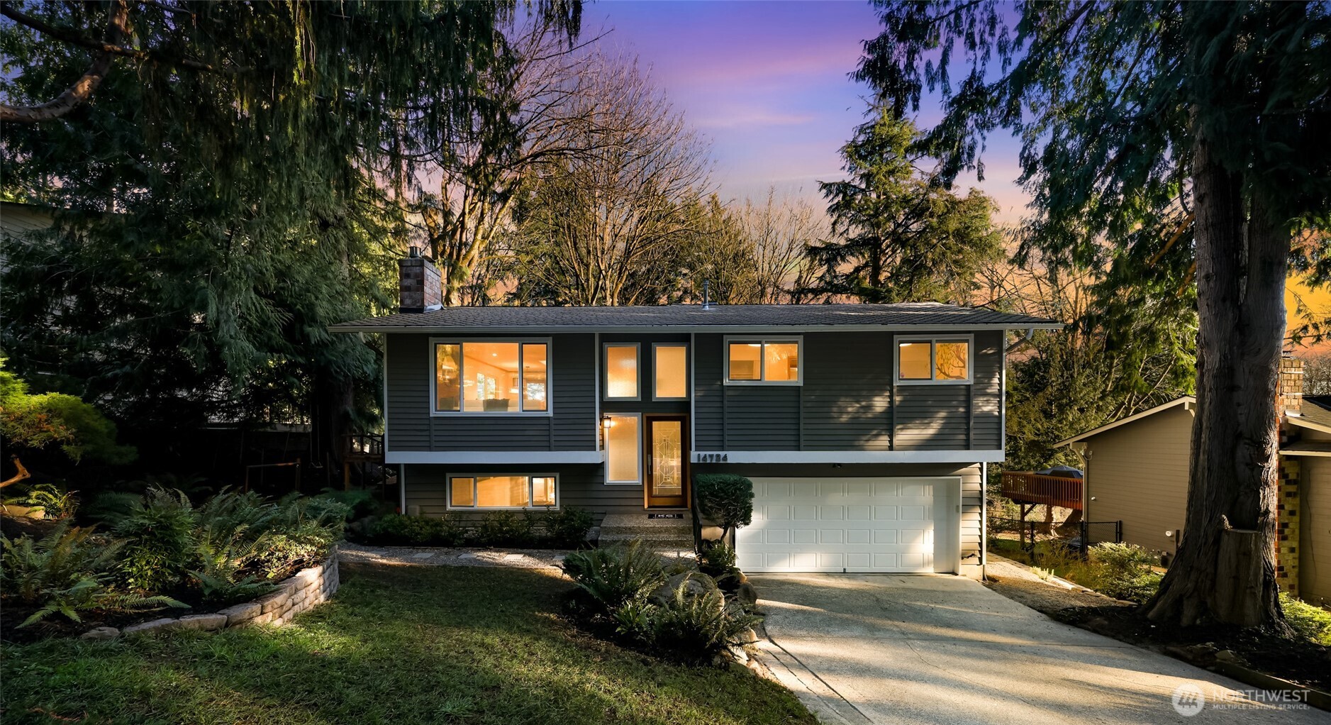 Tucked away on a quiet greenbelt setting, this enchanting Norway Hill home feels like a hidden retreat. From the moment you arrive, it’s clear this home has been cherished, with extensive yet thoughtful updates and immaculate care at every turn. Sunlight fills the warm open-concept living spaces, creating an effortless flow for everyday living and memorable gatherings. Outside, the park-esque 8,085 sq ft lot invites morning coffee, evening unwinds, and plenty of playtime, all framed by lush greenery and natural privacy. Peaceful and private, yet just minutes from the best of the Eastside—this is a place to slow down, breathe deep, and truly feel at home.