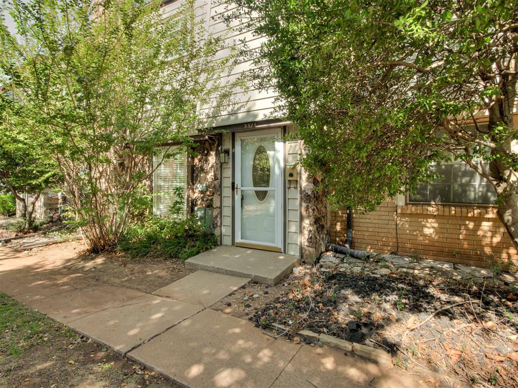 Easy living in a great NW OKC location near Quail Creek! This 2-bedroom, 1.5-bath townhome features a spacious living room with a brick fireplace, a kitchen with granite countertops and stainless steel appliances, and a downstairs half bath for guests. The enclosed patio connects the garage to the home and offers flexible space for a home office, hobby room, or extra hangout spot. Upstairs, both bedrooms feature unique brick accents. An attached 2-car garage adds convenience and storage, while the HOA covers exterior maintenance and includes access to the community pool. Stackable washer and dryer stay! Close to shopping, dining, and major commuter routes.