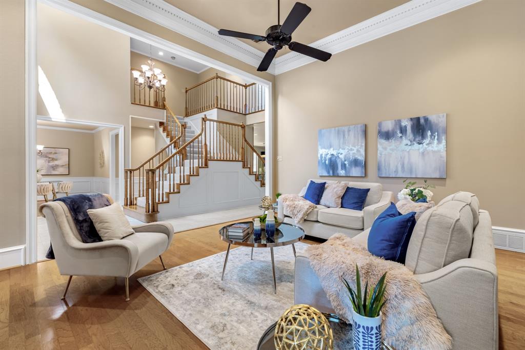 ALL OF THE SPACE YOU COULD NEED is offered in this hard to find FIVE BR floorplan just steps away from Plano's prettiest wooded hike & bike trail and Chisholm Trail Park all in the heart of sought after Forest Creek Estates...voted PLATINUM LEVEL BEST NEIGHBORHOOD year after year! A stunning leaded glass double door entry leads you into the soaring two-story foyer with incredible three-sided staircase that is the central focal point in the open floorplan. And what a floorplan! Generous room proportions and ideally situated bedroom layout offer sought after Primary + 5th bedroom DOWN plus three BIG bedrooms and two full baths plus loft UP!  Split formals have hardwood floors, and the Living Room's floor to ceiling fireplace ...just WOW! HUGE island Kitchen offers ample custom cabinetry, updated LED lighting, stainless steel appliances including double ovens, granite counters and is OPEN to a STUNNING two-story Family Room! The Kitchen also has a giant walk-in pantry and a built-in hutch with leaded glass doors + planning desk! Family Room has a handsome onyx marble raised hearth fireplace, plenty of space for oversized furniture to host a crowd and is wrapped in warm picture frame paneling! Double French doors lead to the expanded covered patio and completely PRIVATE yard with lush lawn + space for a pool. Primary Bedroom Suite is split for privacy and features cathedral ceiling, hardwood floors and updated bath that feels like a SPA with oversized rain shower, marble counters, polished chrome fixtures. A huge skylight floods the space with natural light! Downstairs you will also find a totally private 5th bedroom wing with hardwood floors, HUGE walk-in closet and adjacent full bath, making the ideal space for visiting or live in in-laws (or nursery or study...the flexibility of the space evolves with your growing family!). Don't miss your opportunity to move into a neighborhood everyone wants to live in with room to grow at an excellent price!