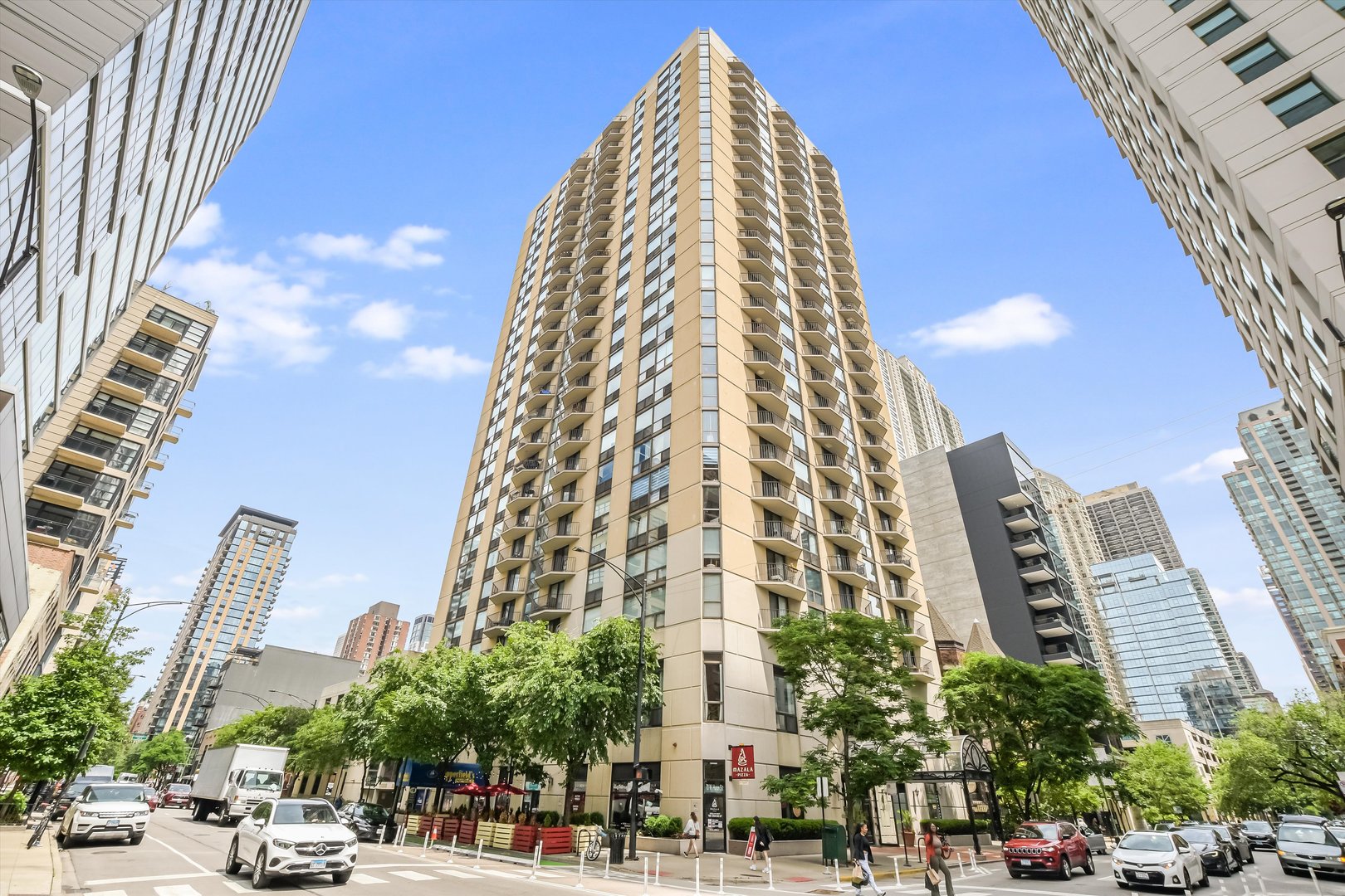 Primely located in River North, this elegant 1-bedroom condo is nestled in a classic full amenity building, the Hermitage on Huron. This home boasts gracious room sizes, HDWD floors, SS appliances, ample closet space with custom organizers and private balcony. Building amenities include: DOORMAN, GYM, LAUNDRY, SAUNA, PARTY ROOM, GROCERY, DRY CLEANERS, & 1-OF-A-KIND FURNISHED COMMON SUNDECK.     Low HOA covers water, trash, internet and central heat and cooling. No rental cap in the building. Current lease ends in June 2026 but tenant is able to vacate with 60-day notice. Ideal for either home or investment!